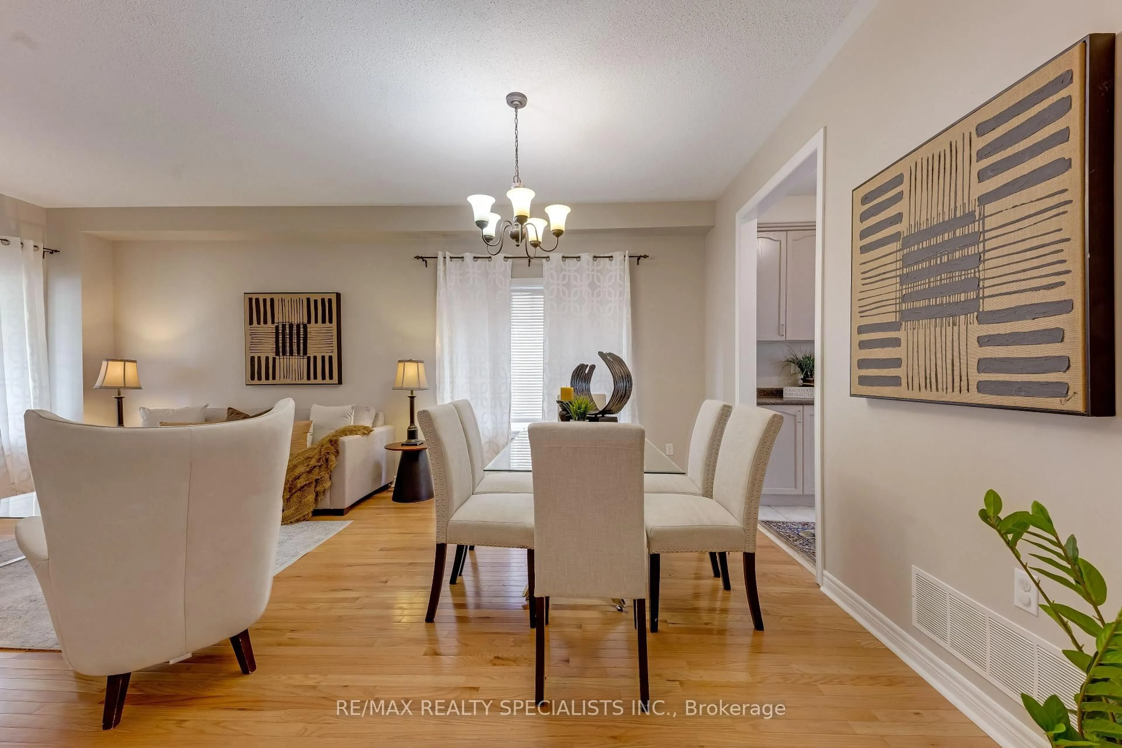 Dining room, wood/laminate floor for 59 Masters Green Cres, Brampton Ontario L7A 3K6