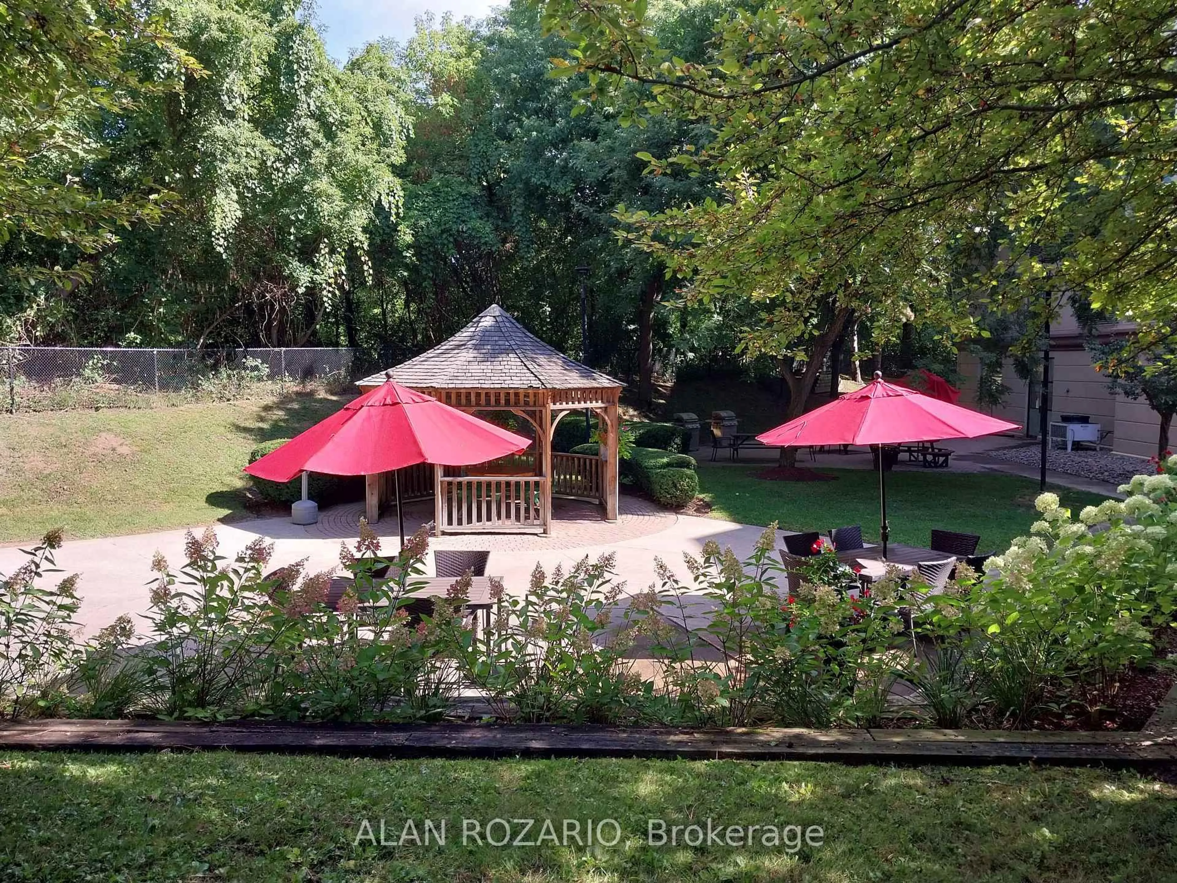 A pic from outside/outdoor area/front of a property/back of a property/a pic from drone, forest/trees view for 8351 Mclaughlin Rd #103, Brampton Ontario L6Y 4H8