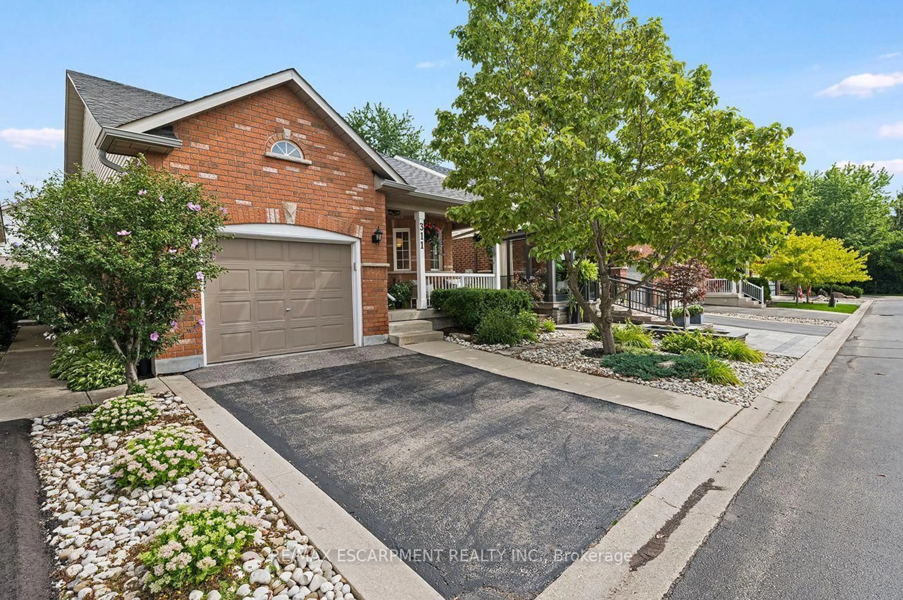 Home with brick exterior material, street for 311 Malick St, Milton Ontario L9T 5X4