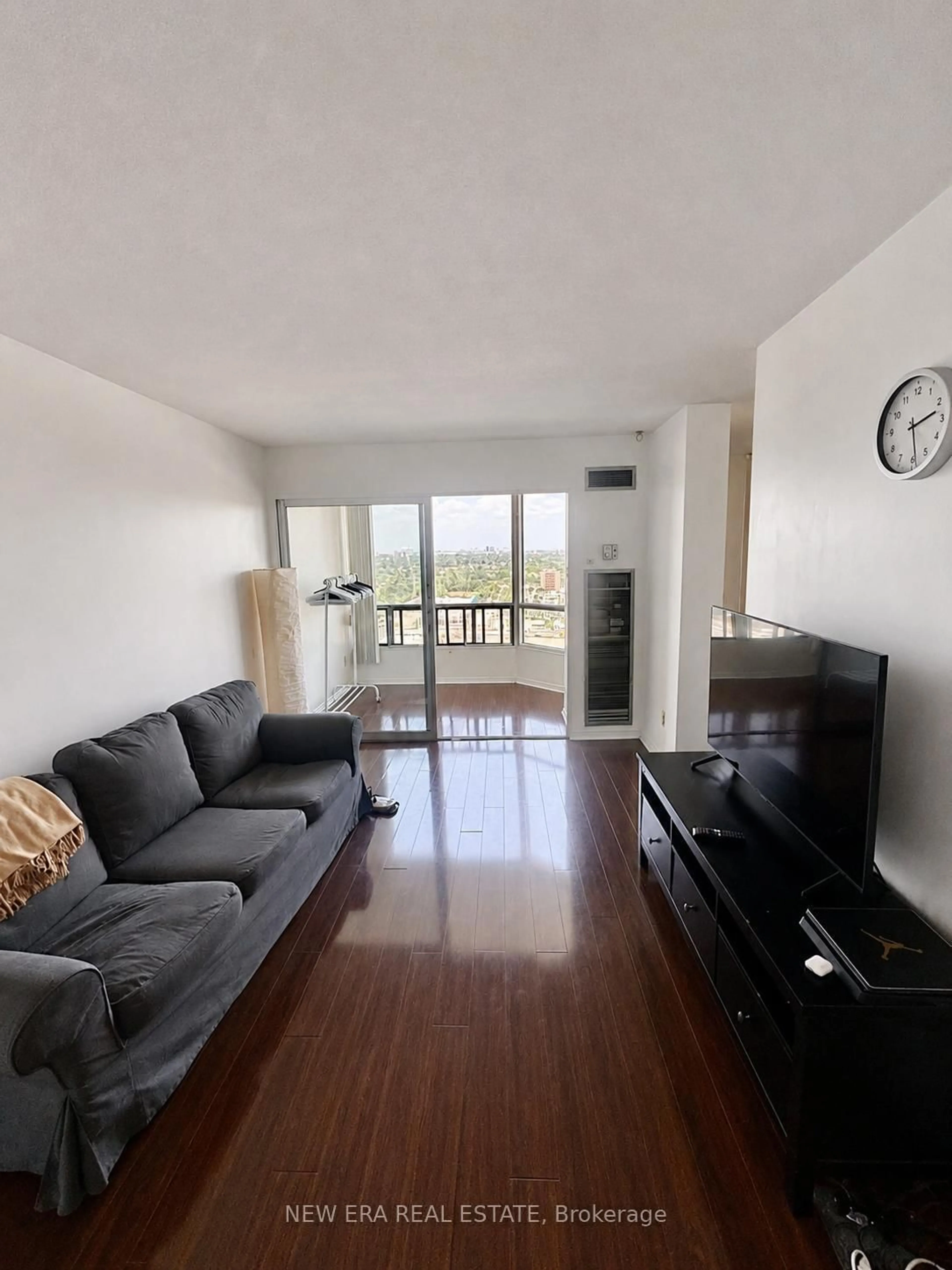 Living room with furniture, wood/laminate floor for 115 Hillcrest Ave #1912, Mississauga Ontario L5B 3Y9