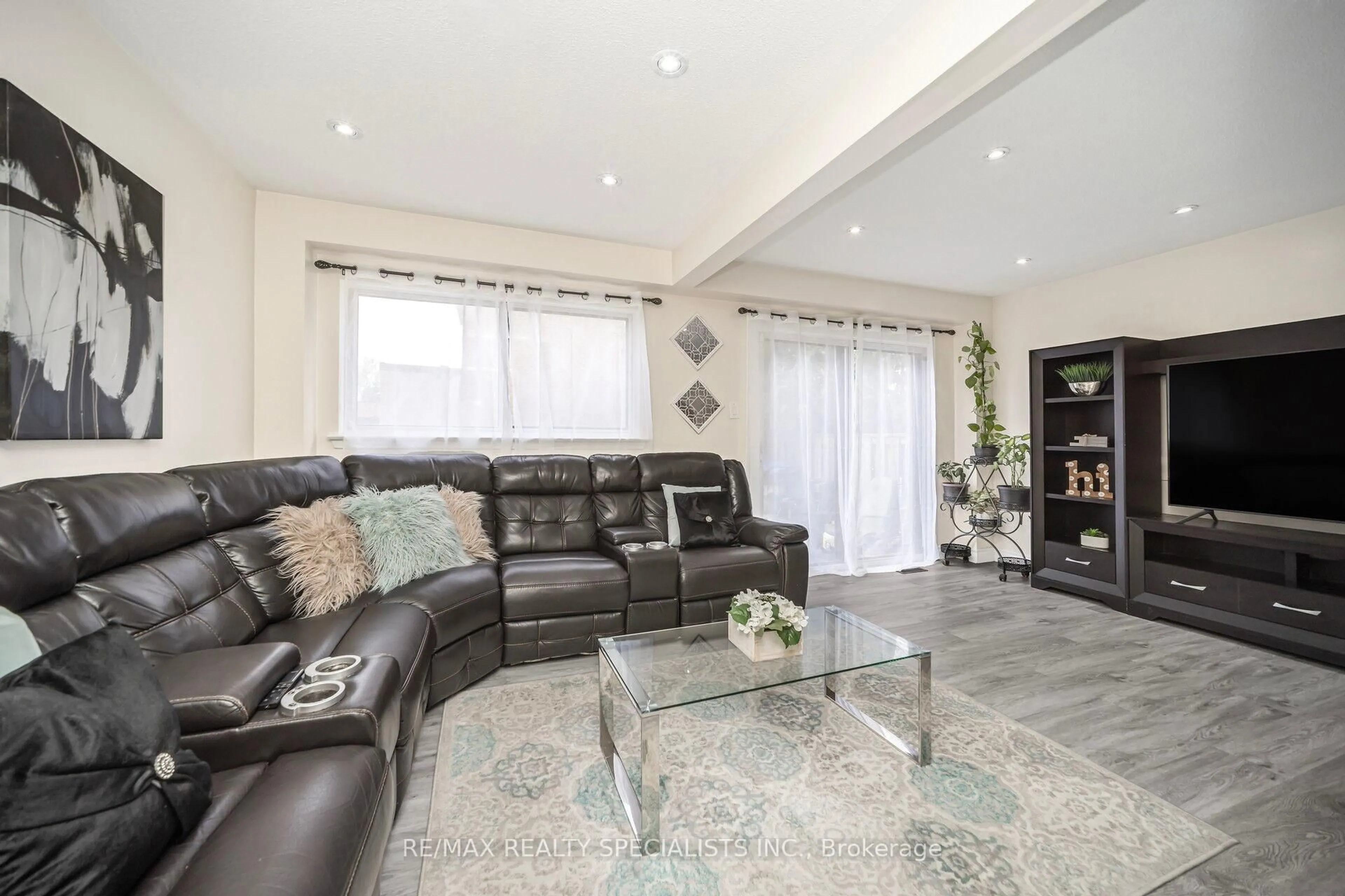 Living room with furniture, unknown for 144 Fleetwood Cres, Brampton Ontario L6T 2E6
