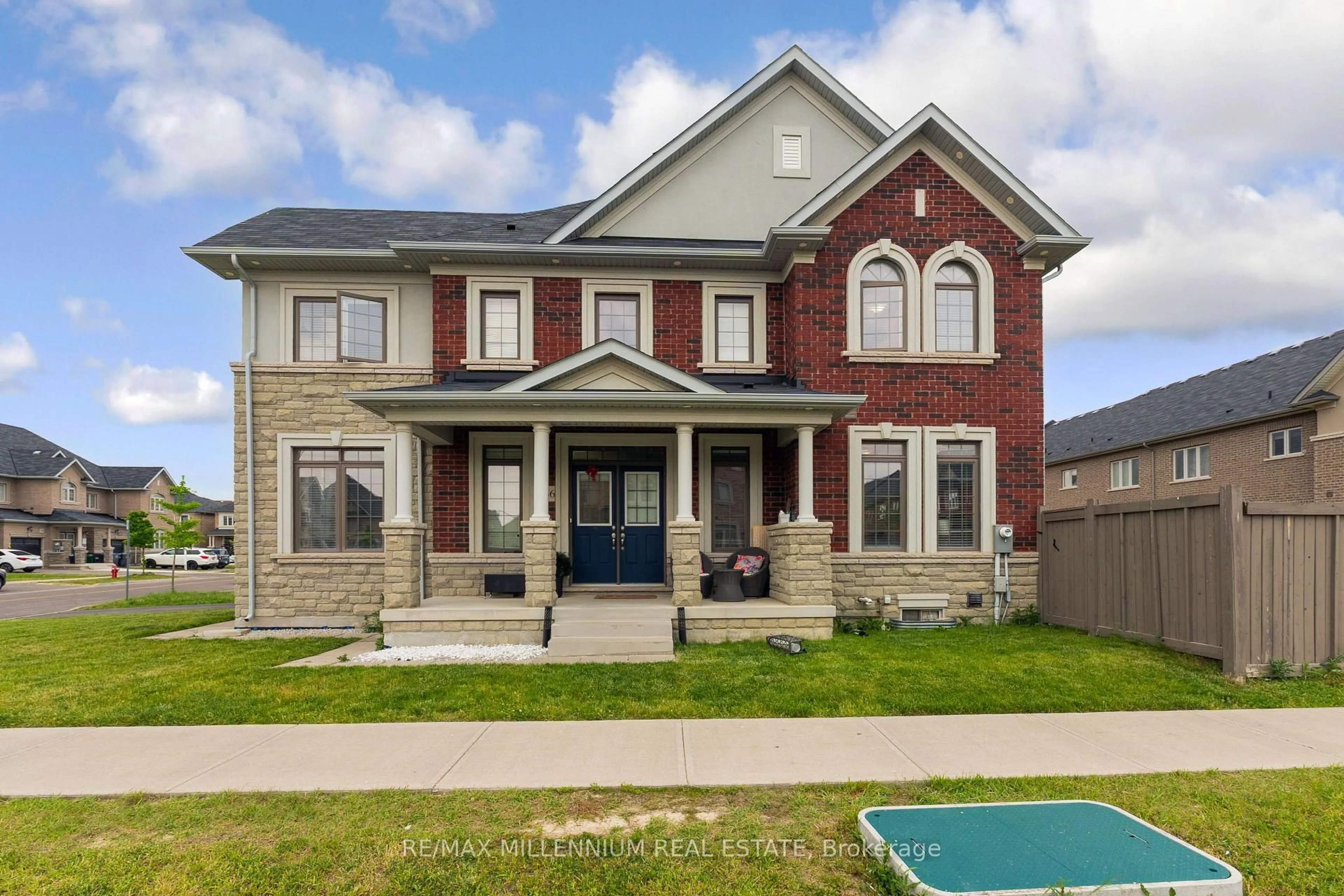 Home with brick exterior material, street for 366 Remembrance Rd, Brampton Ontario L7A 0C3
