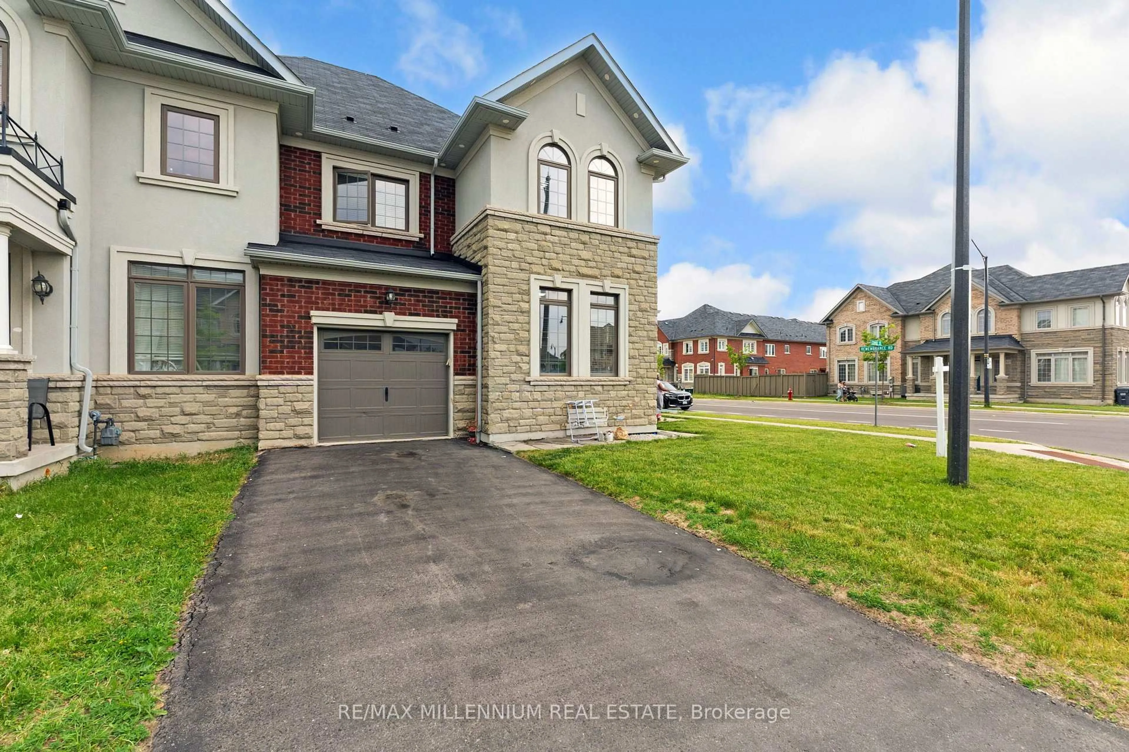 Home with brick exterior material, street for 366 Remembrance Rd, Brampton Ontario L7A 0C3