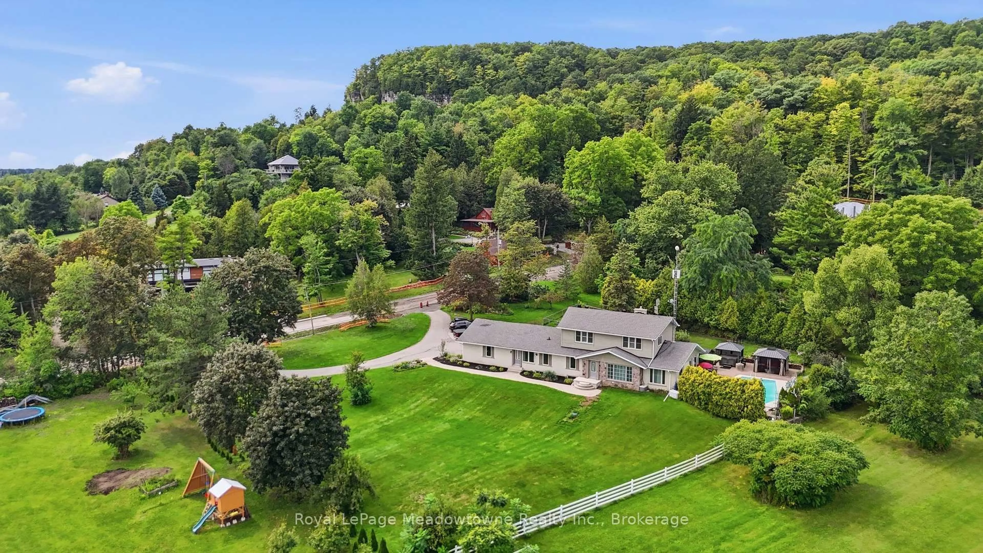 A pic from outside/outdoor area/front of a property/back of a property/a pic from drone, unknown for 7053 Appleby Line, Milton Ontario L9T 2Y1