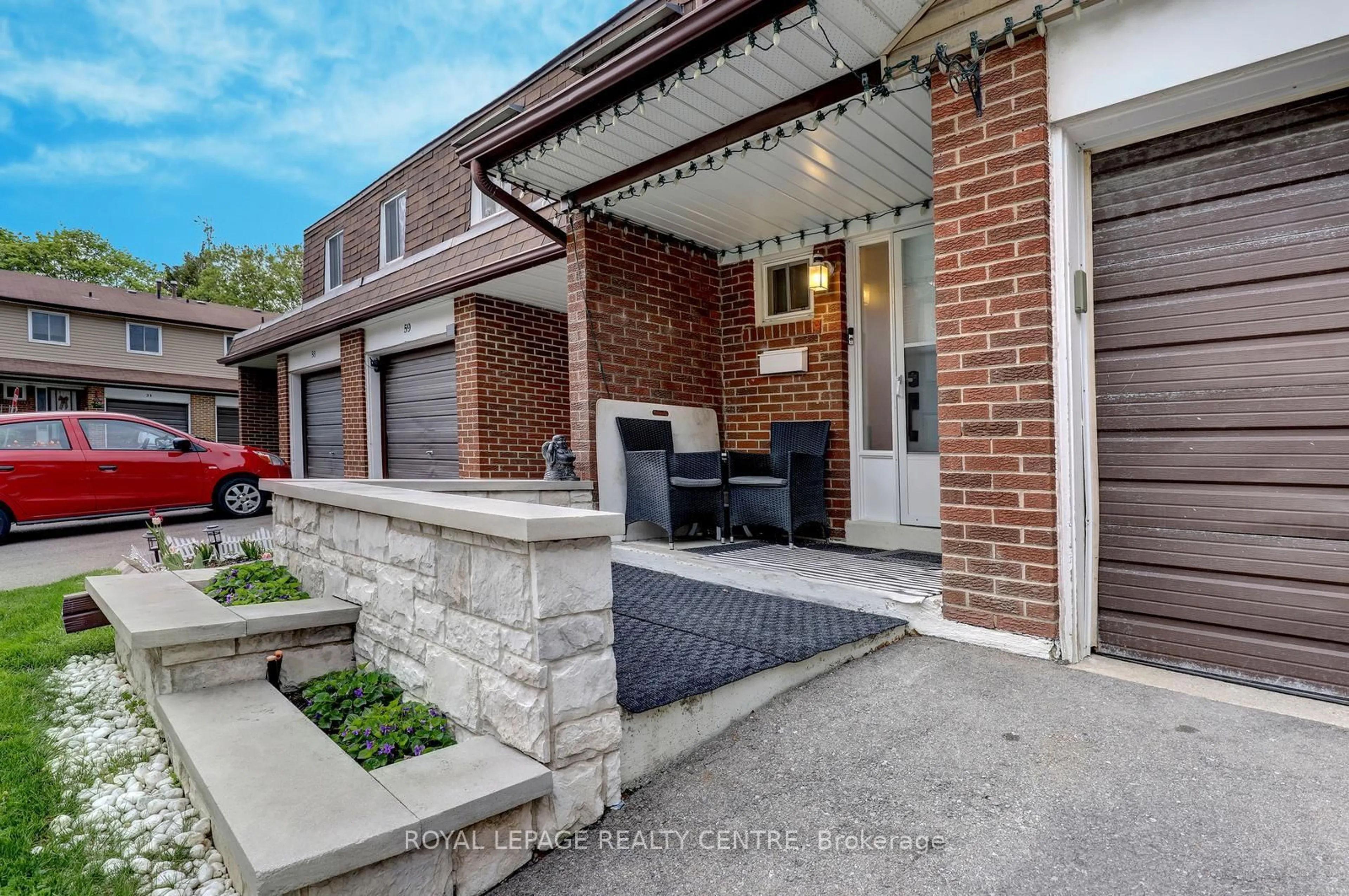 Home with brick exterior material, street for 3025 Cedarglen Gate #60, Mississauga Ontario L5C 2V7