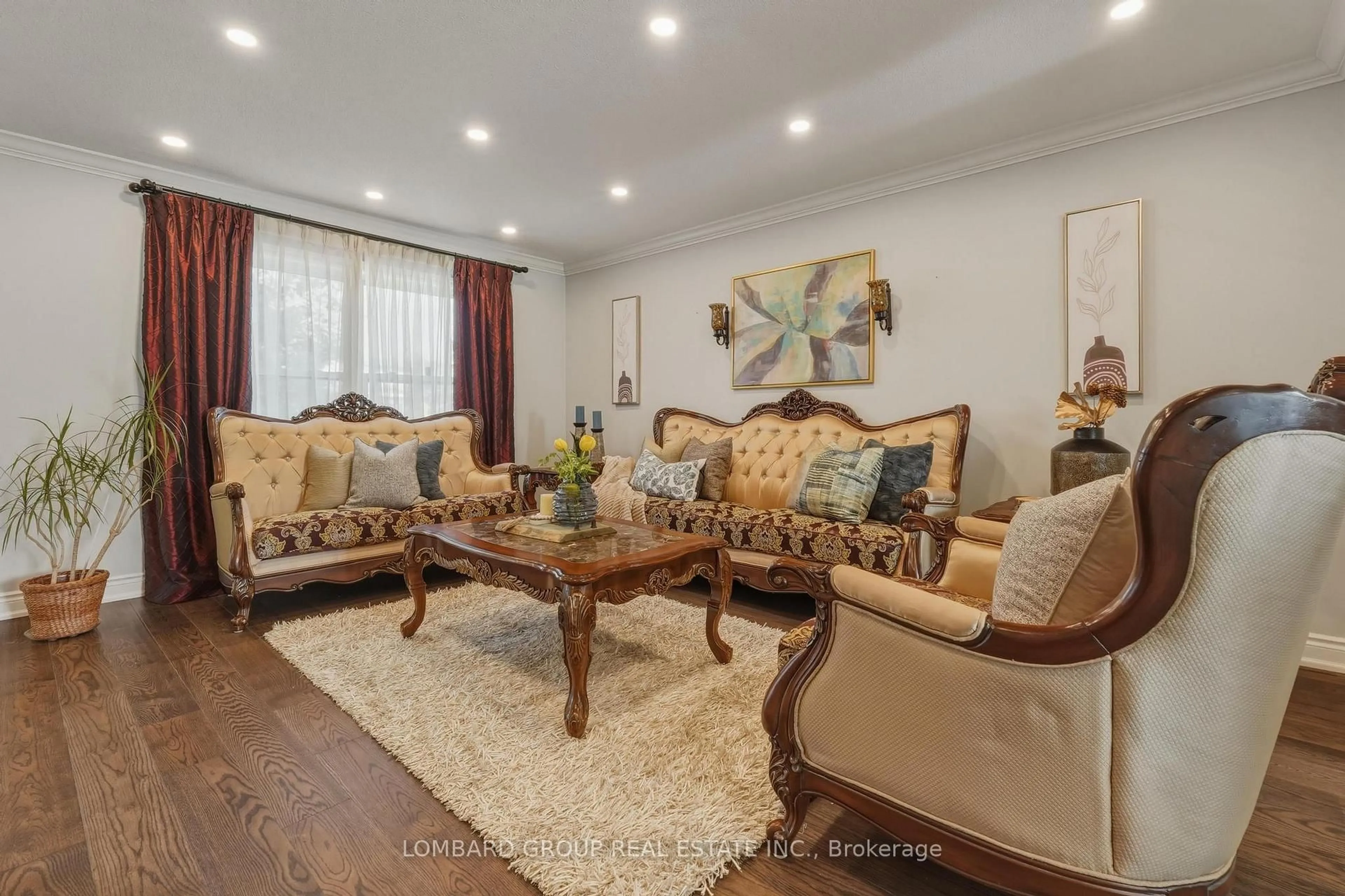 Living room with furniture, wood/laminate floor for 10 Whitmore Crt, Brampton Ontario L6Z 2A5
