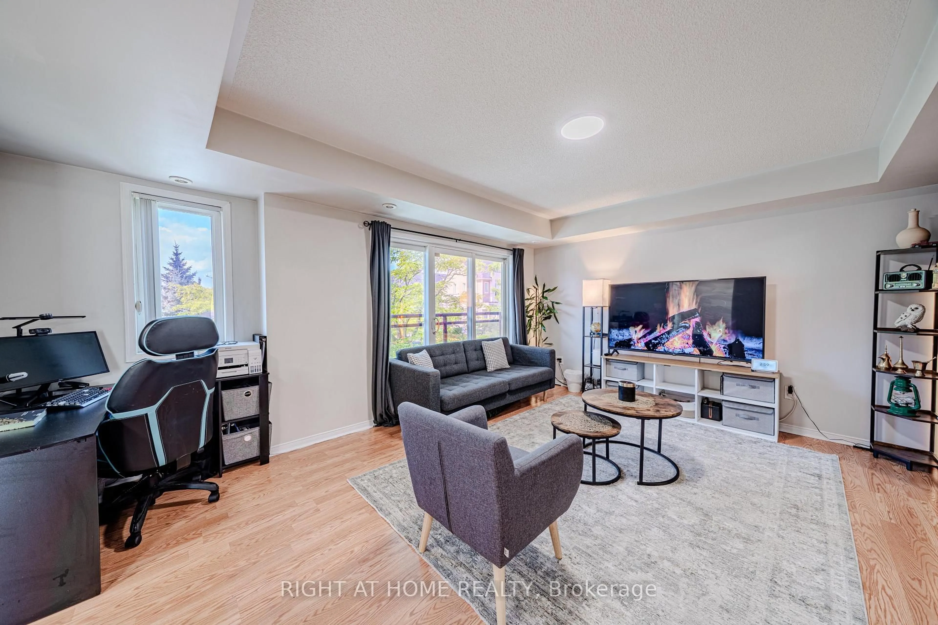 Living room with furniture, unknown for 5035 Oscar Peterson Blvd #100, Mississauga Ontario L5M 0P4