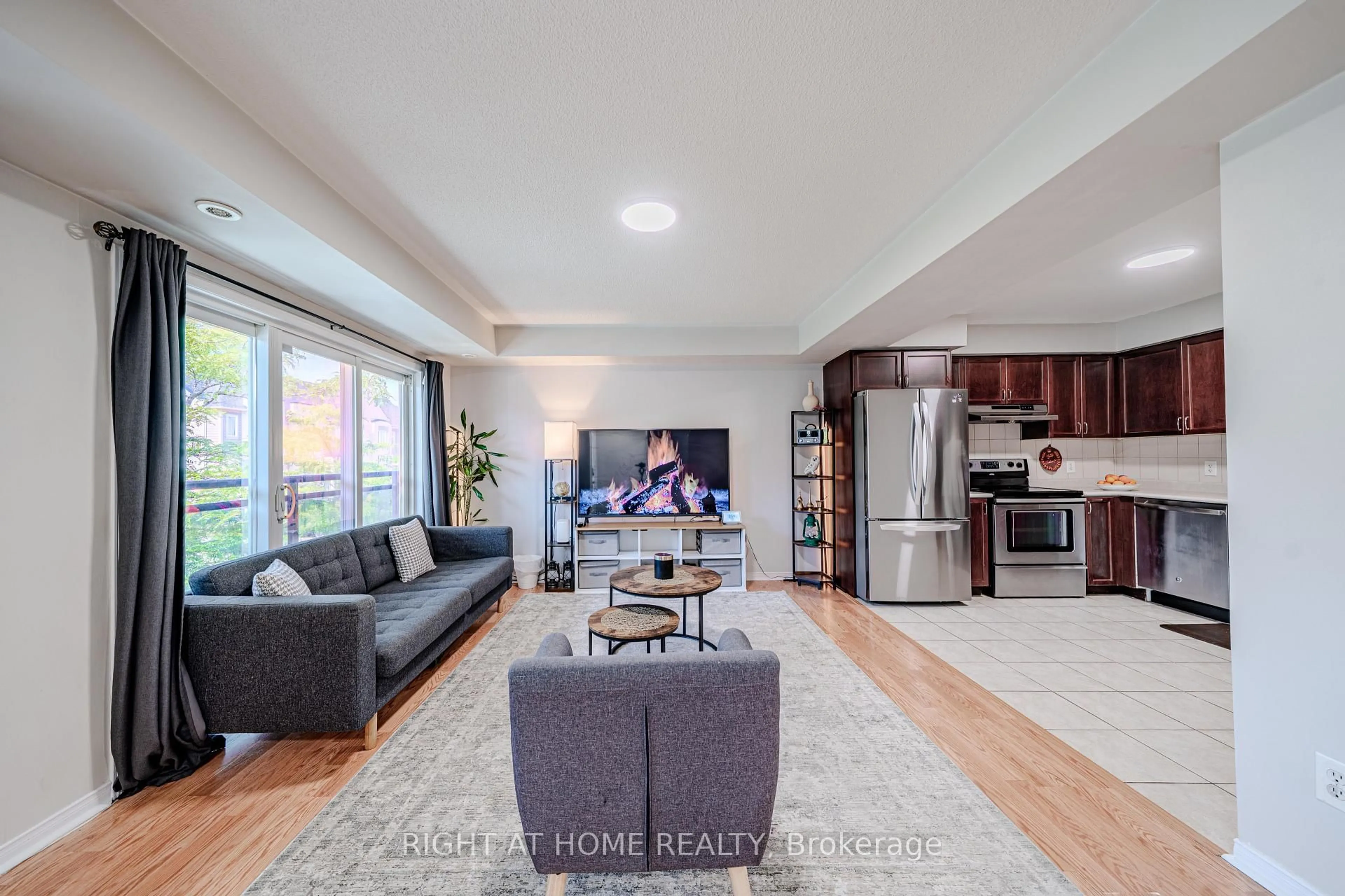 Living room with furniture, unknown for 5035 Oscar Peterson Blvd #100, Mississauga Ontario L5M 0P4