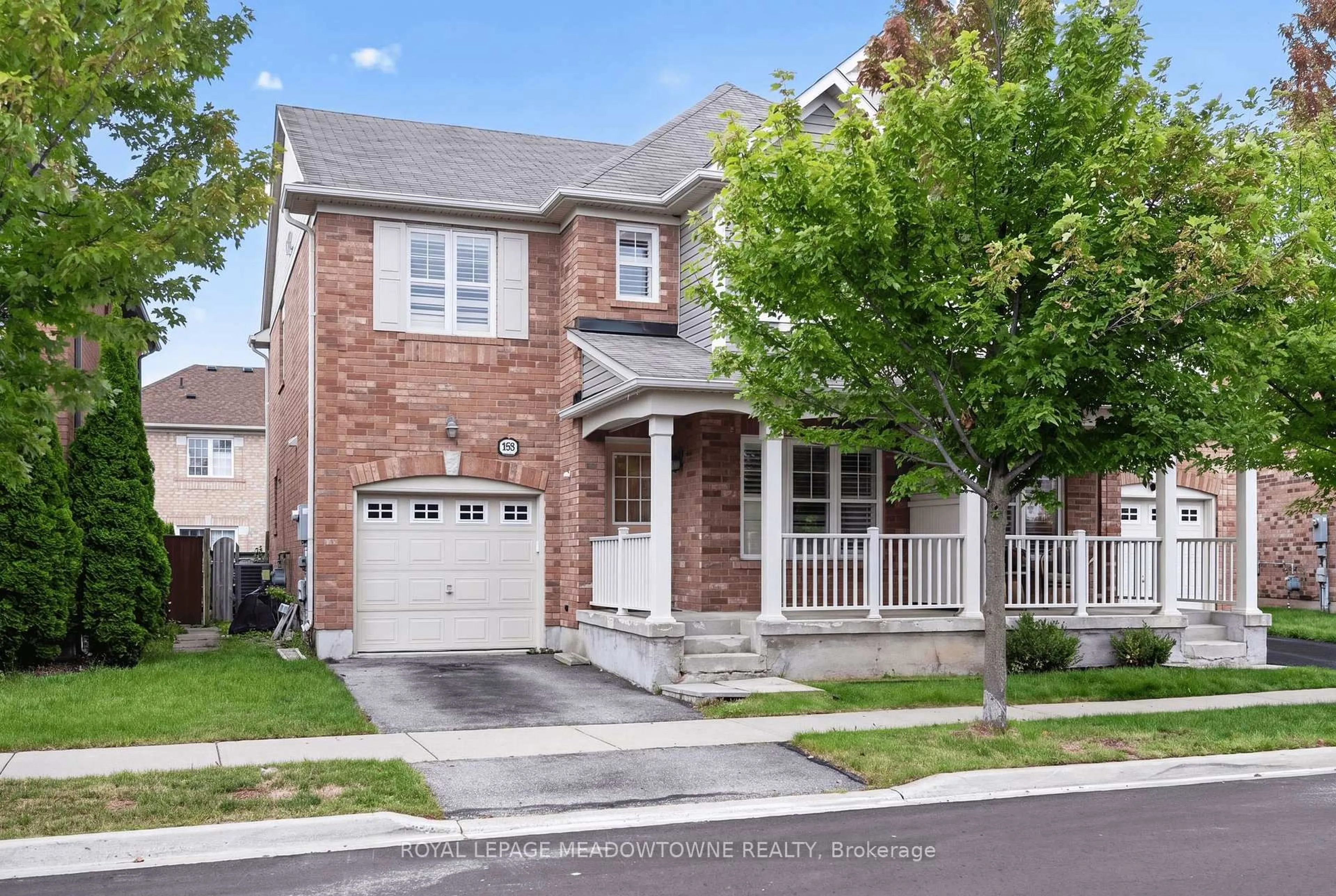 Home with brick exterior material, street for 928 Raftis Cres, Milton Ontario L9T 6Z2