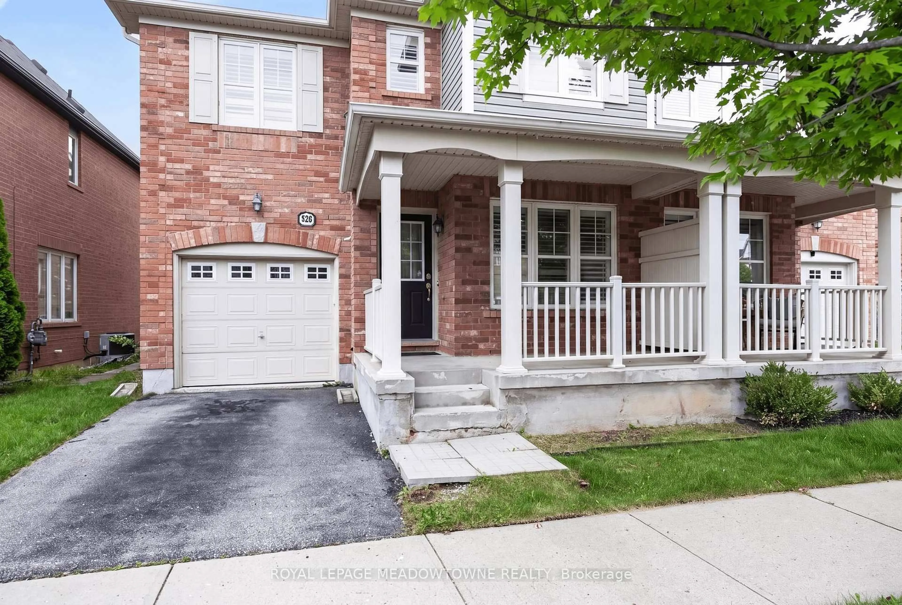 Home with brick exterior material, street for 928 Raftis Cres, Milton Ontario L9T 6Z2