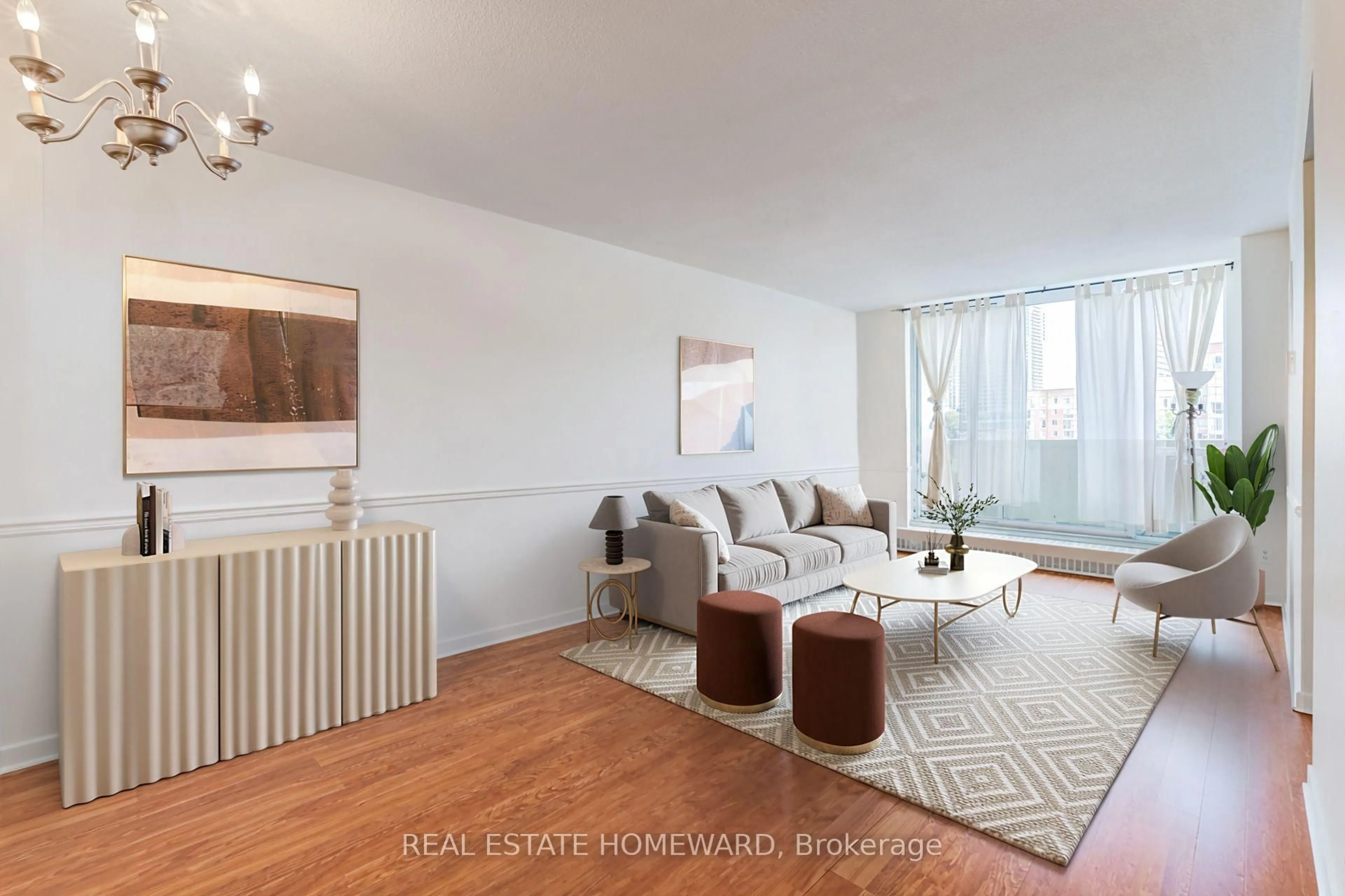 Living room with furniture, wood/laminate floor for 60 Southport St #218, Toronto Ontario M6S 3N4