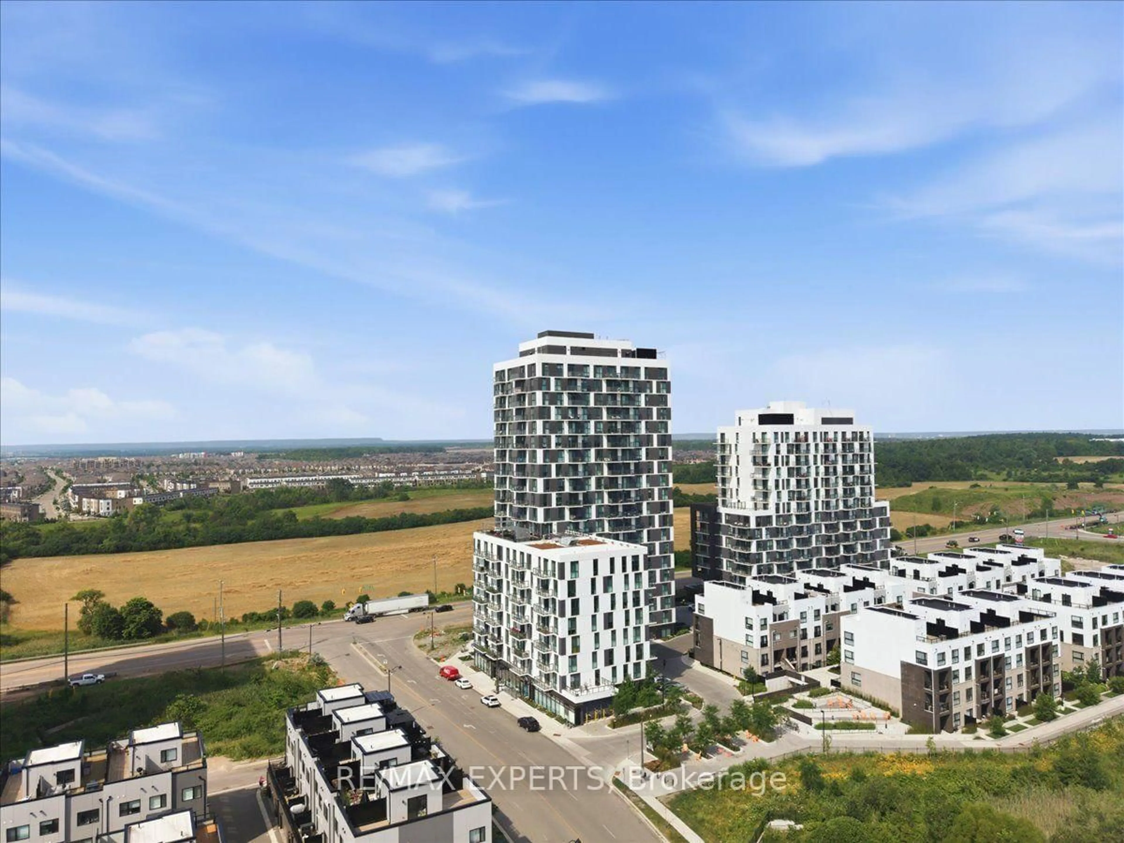 A pic from outside/outdoor area/front of a property/back of a property/a pic from drone, city buildings view from balcony for 335 Wheat Boom Dr #203, Oakville Ontario L6H 7Y1