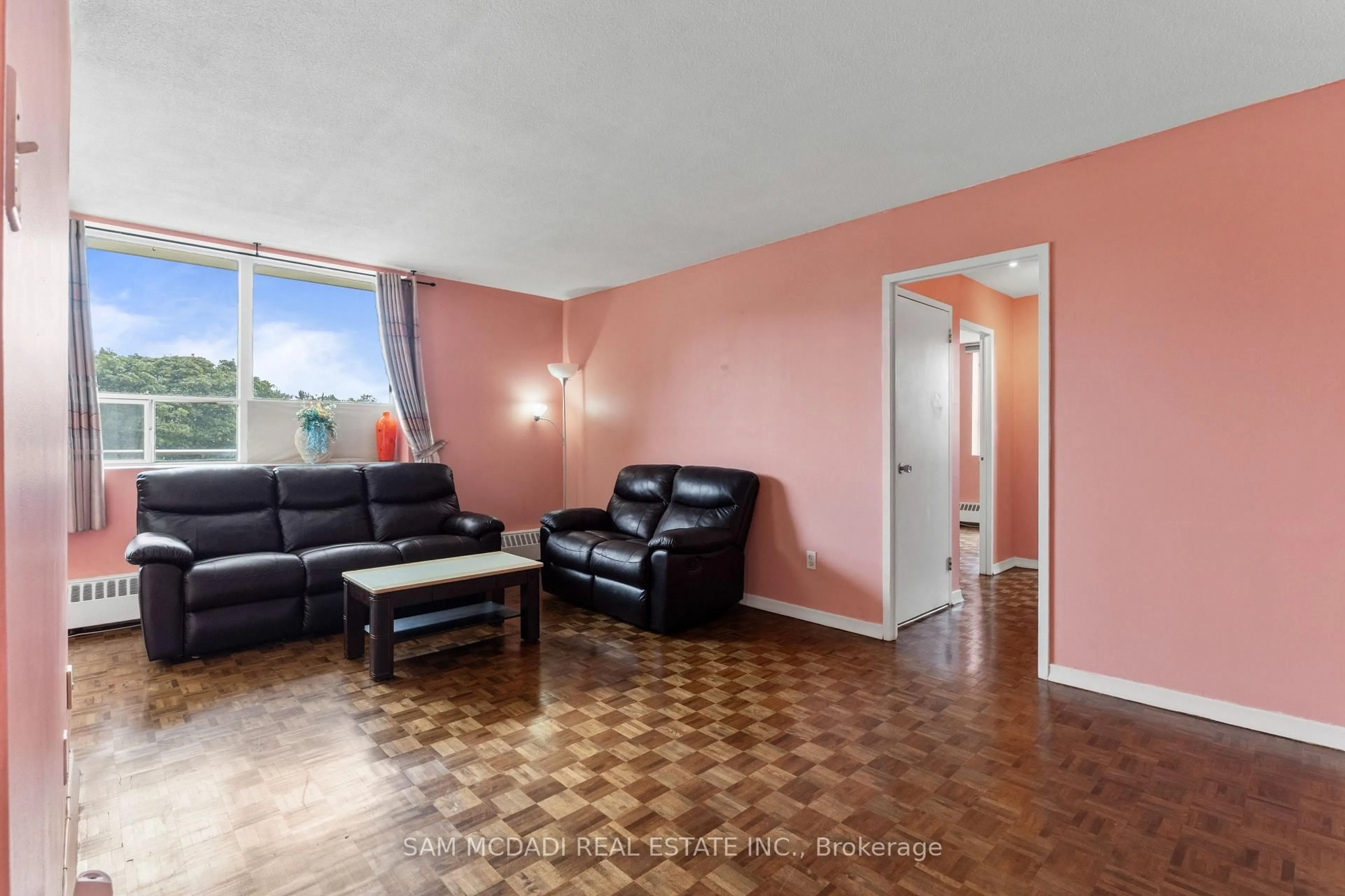 Living room with furniture, unknown for 3145 Queen Frederica Dr #208, Mississauga Ontario L4Y 3A7