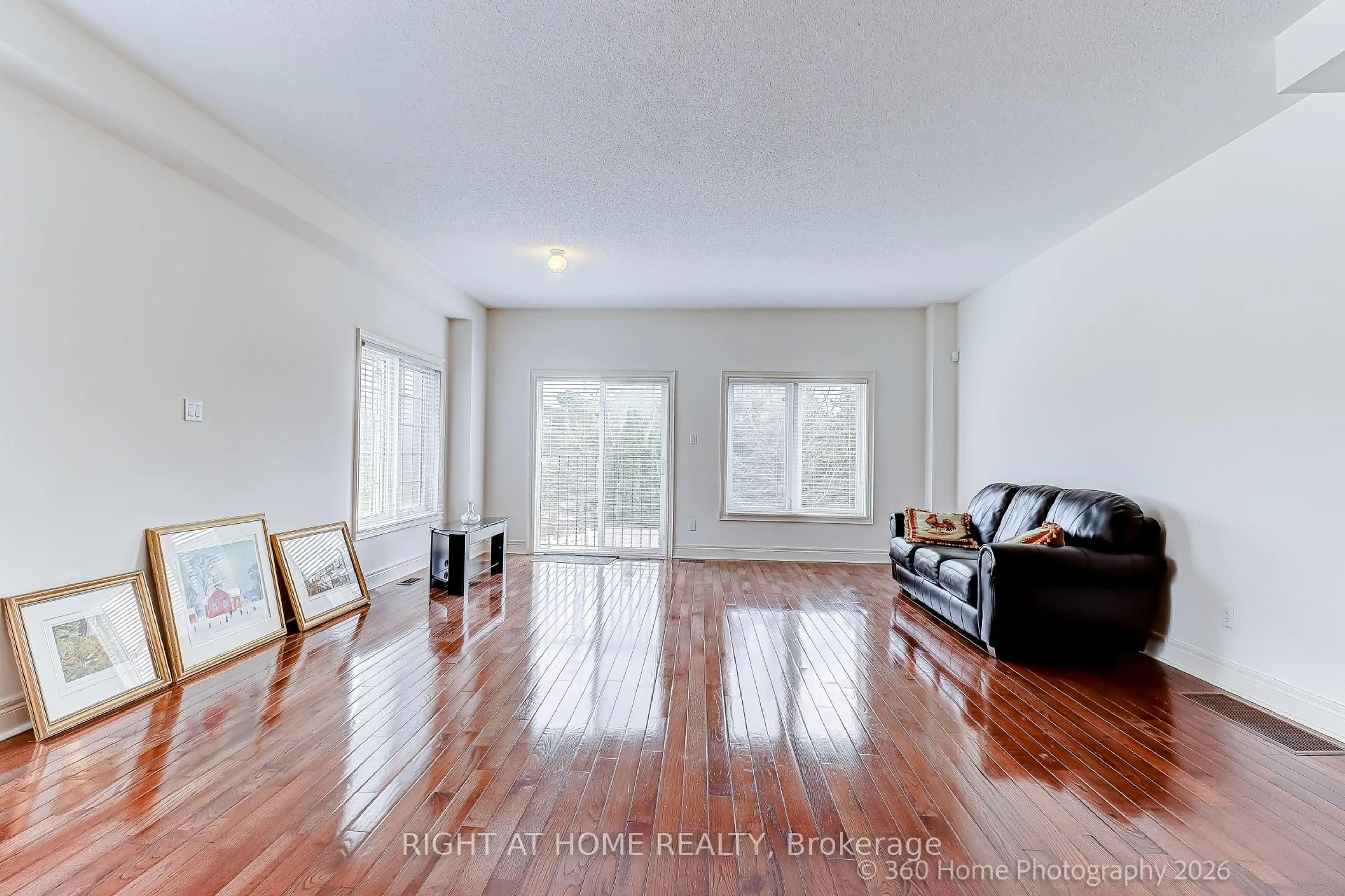 Living room with furniture, wood/laminate floor for 1130 Cawthra Rd #2, Mississauga Ontario L5G 4V7