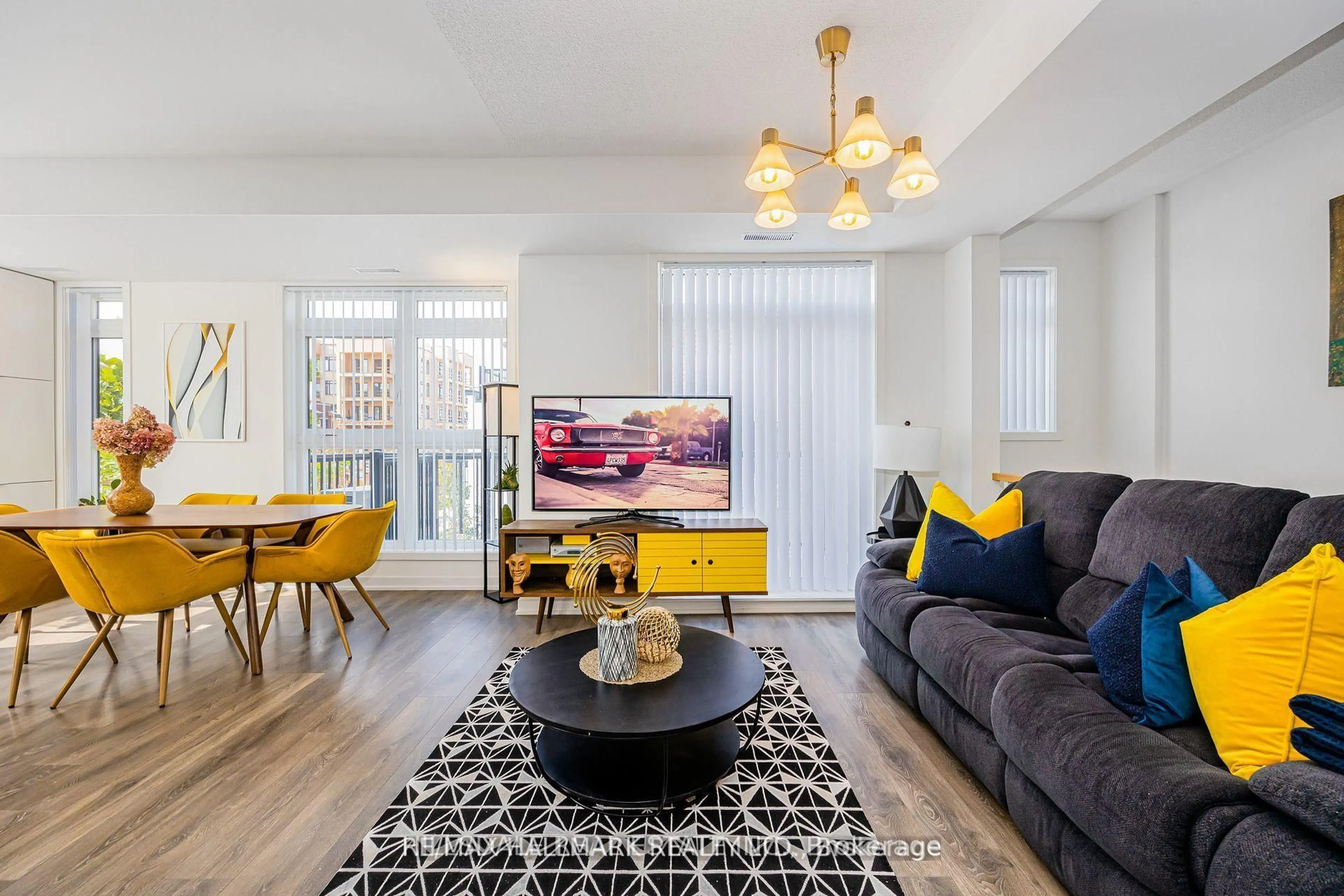 Living room with furniture, unknown for 90 Canon Jackson Dr #207, Toronto Ontario M6M 0C1