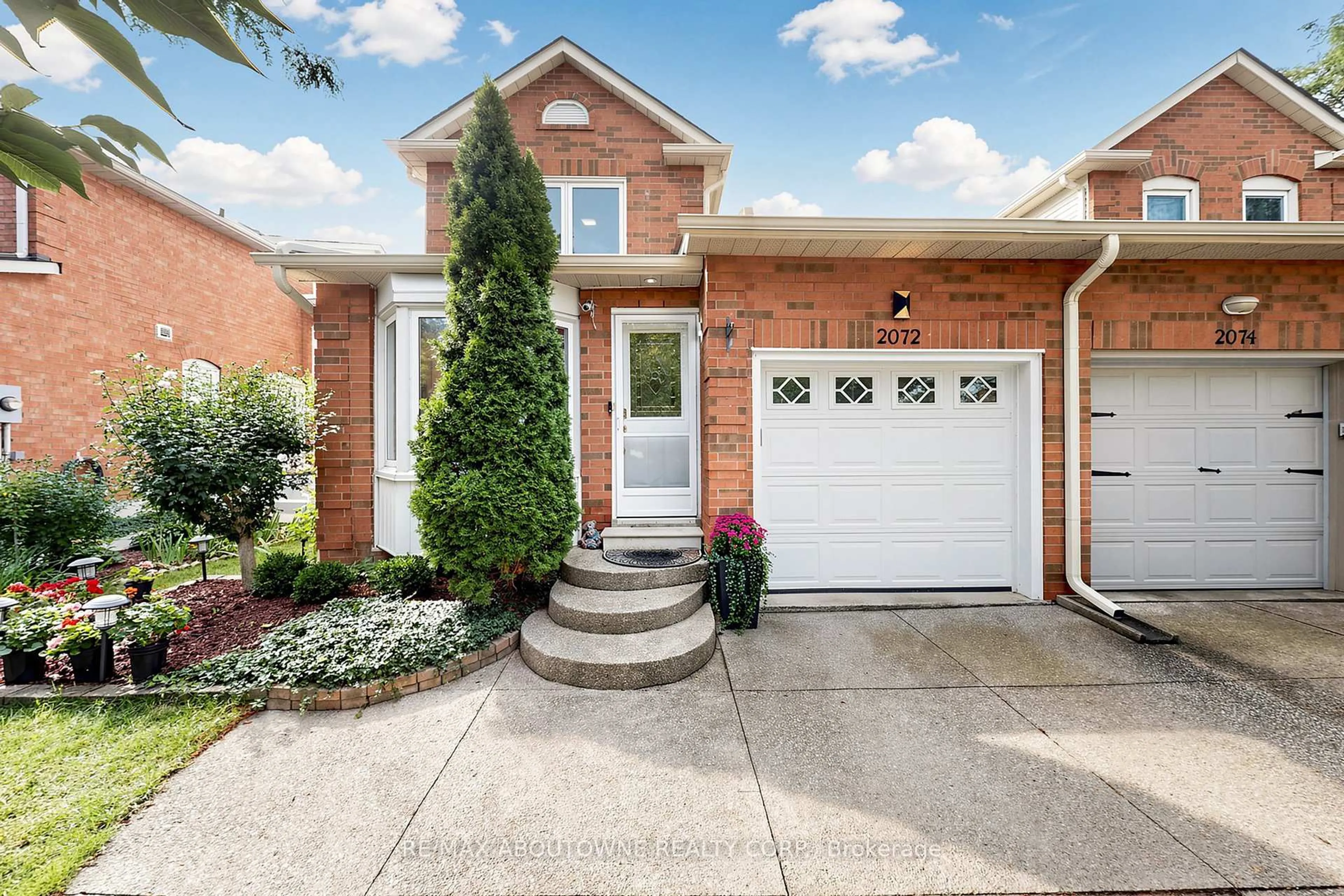 Home with brick exterior material, street for 2072 Glenada Cres, Oakville Ontario L6H 4M2