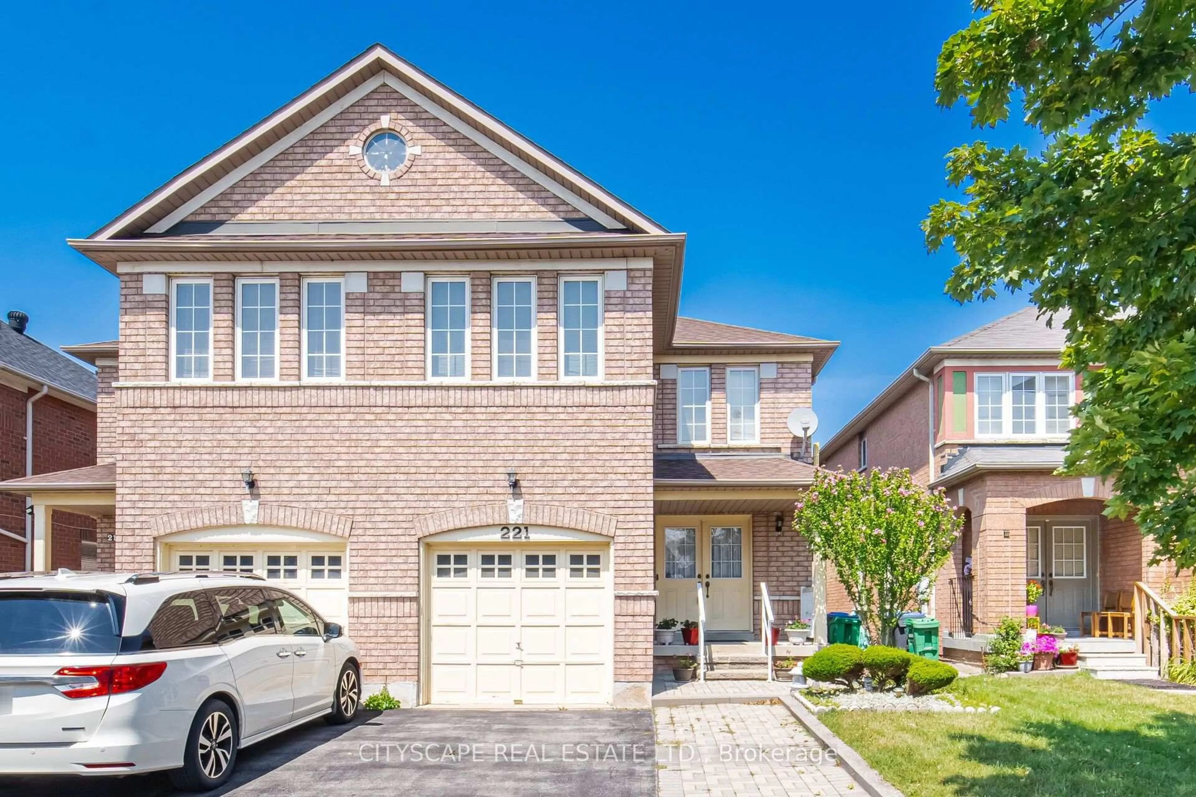 Home with brick exterior material, street for 221 Richvale Dr, Brampton Ontario L6Z 4W2