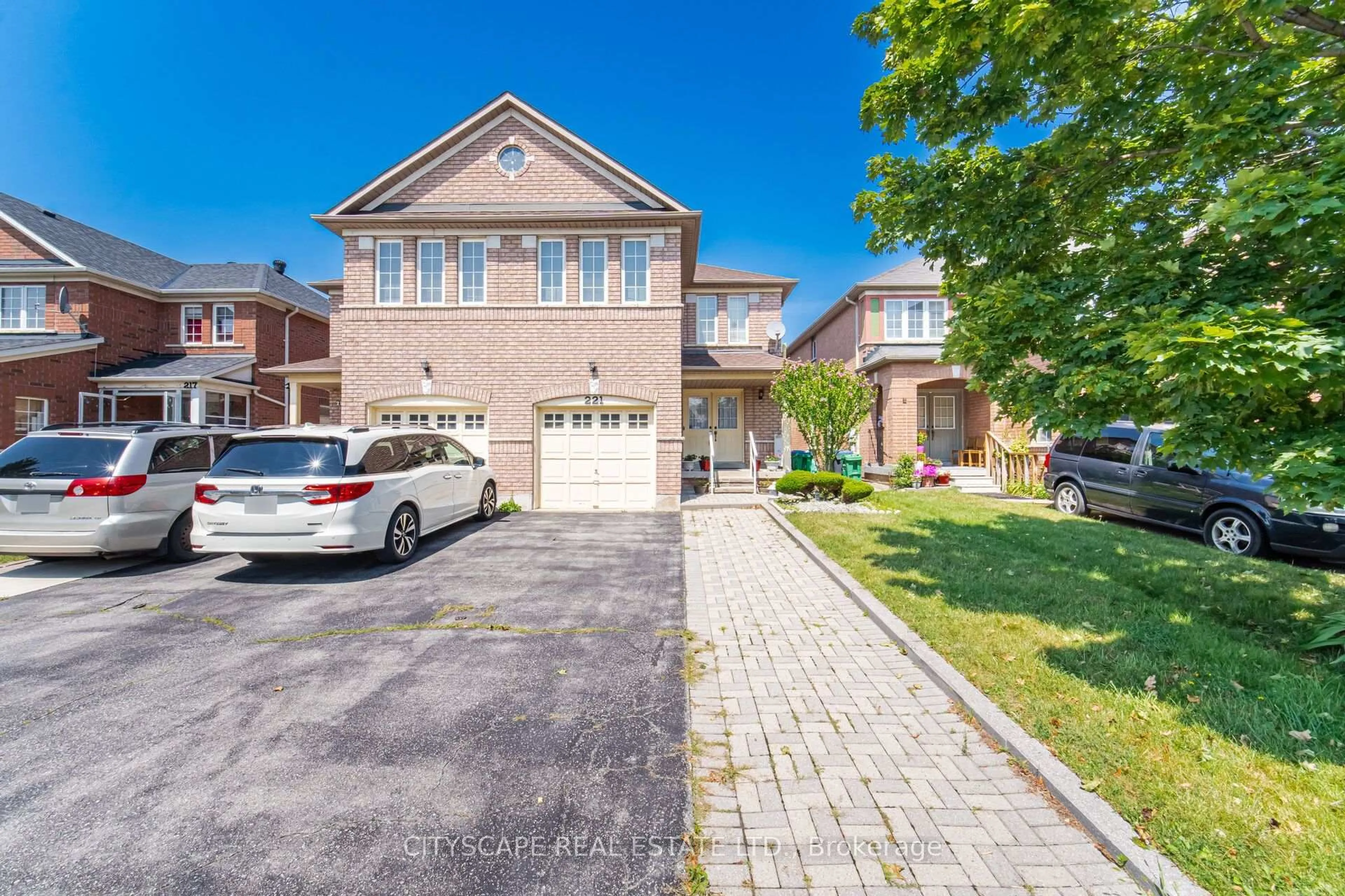 Home with brick exterior material, street for 221 Richvale Dr, Brampton Ontario L6Z 4W2