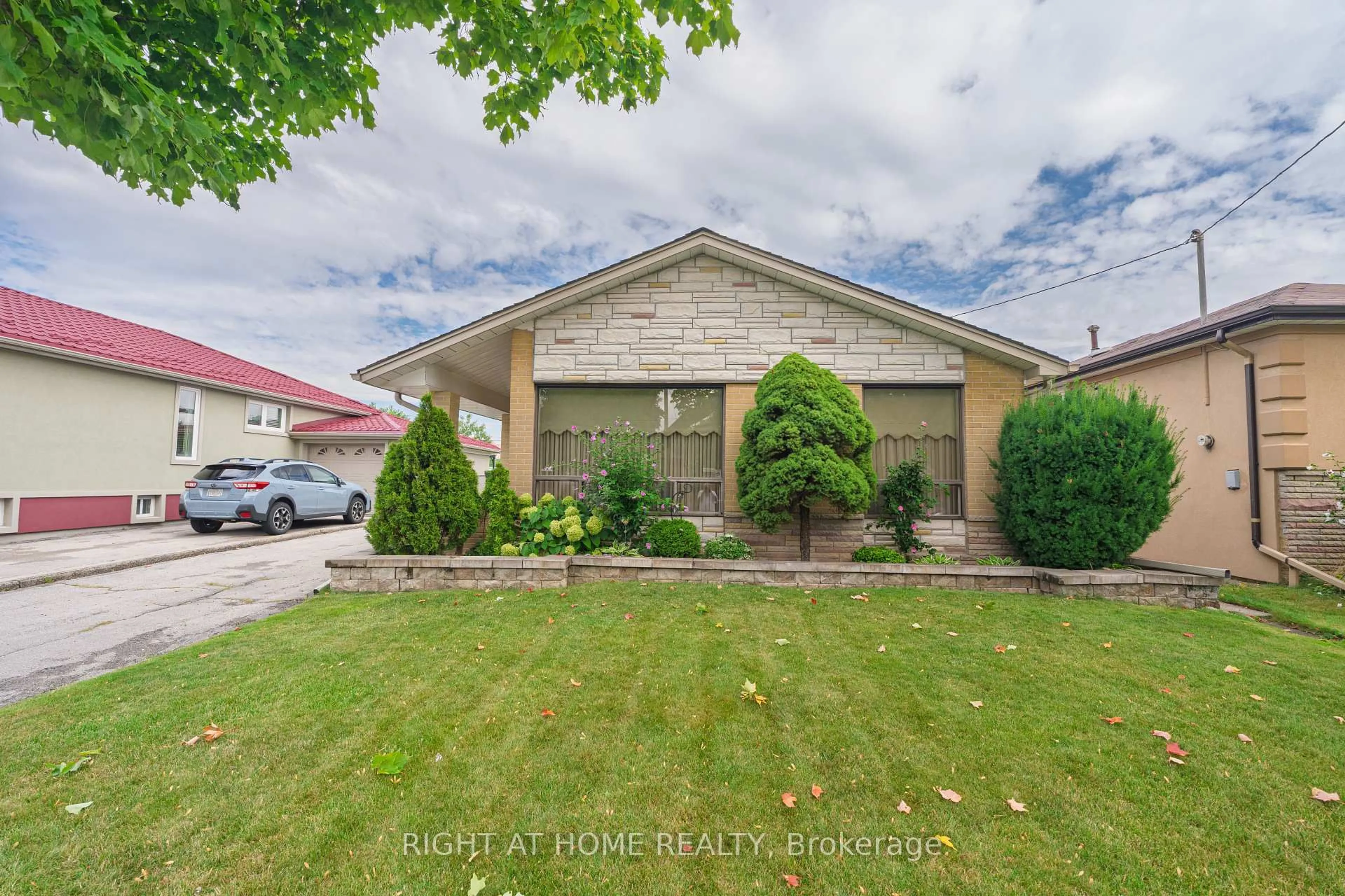 A pic from outside/outdoor area/front of a property/back of a property/a pic from drone, street for 22 Monterrey Dr, Toronto Ontario M9V 1S8