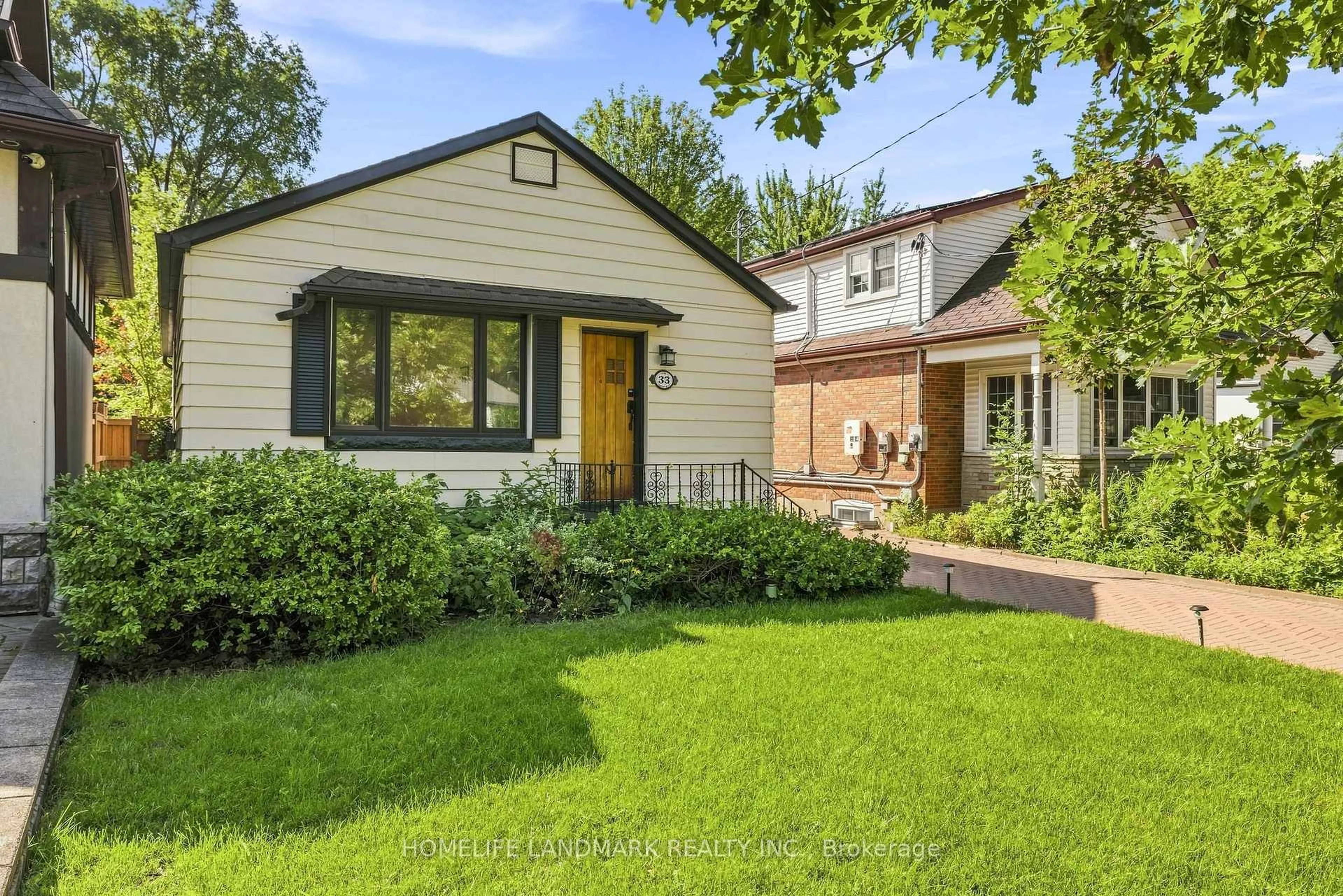 Home with brick exterior material, street for 33 Ash Cres, Toronto Ontario M8W 1E4