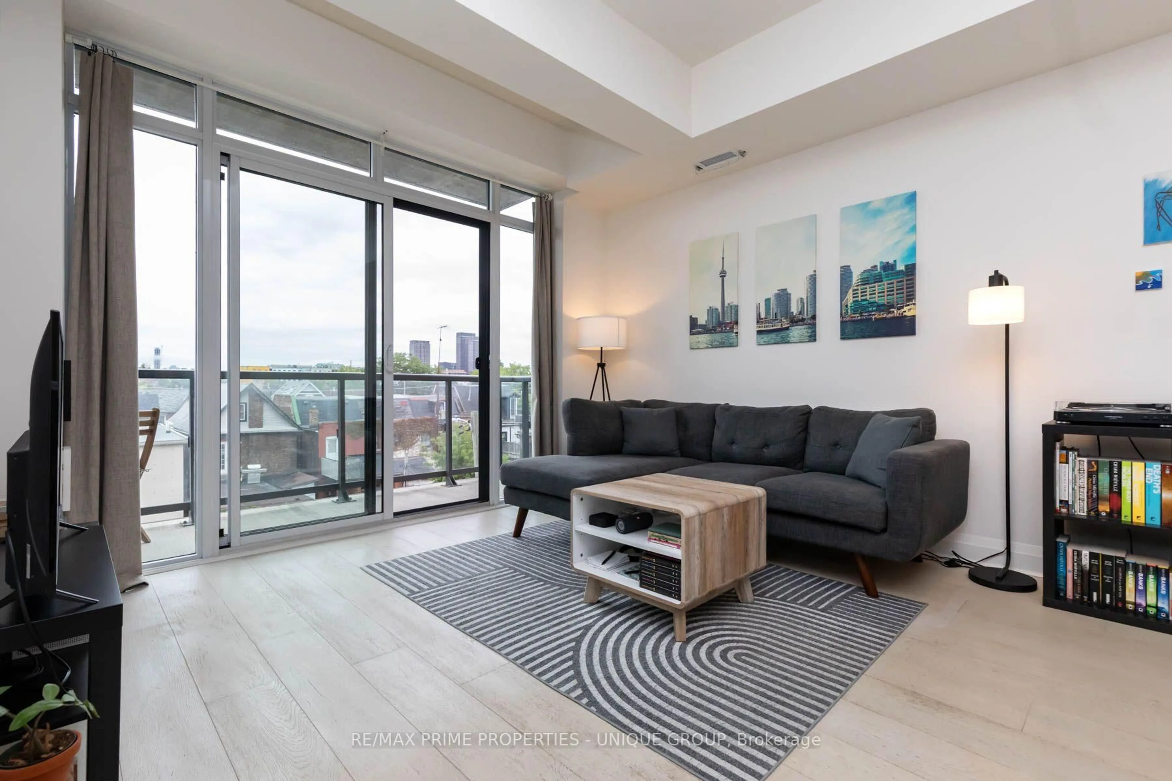 Living room with furniture, unknown for 245 Perth Ave #304, Toronto Ontario M6P 3X9
