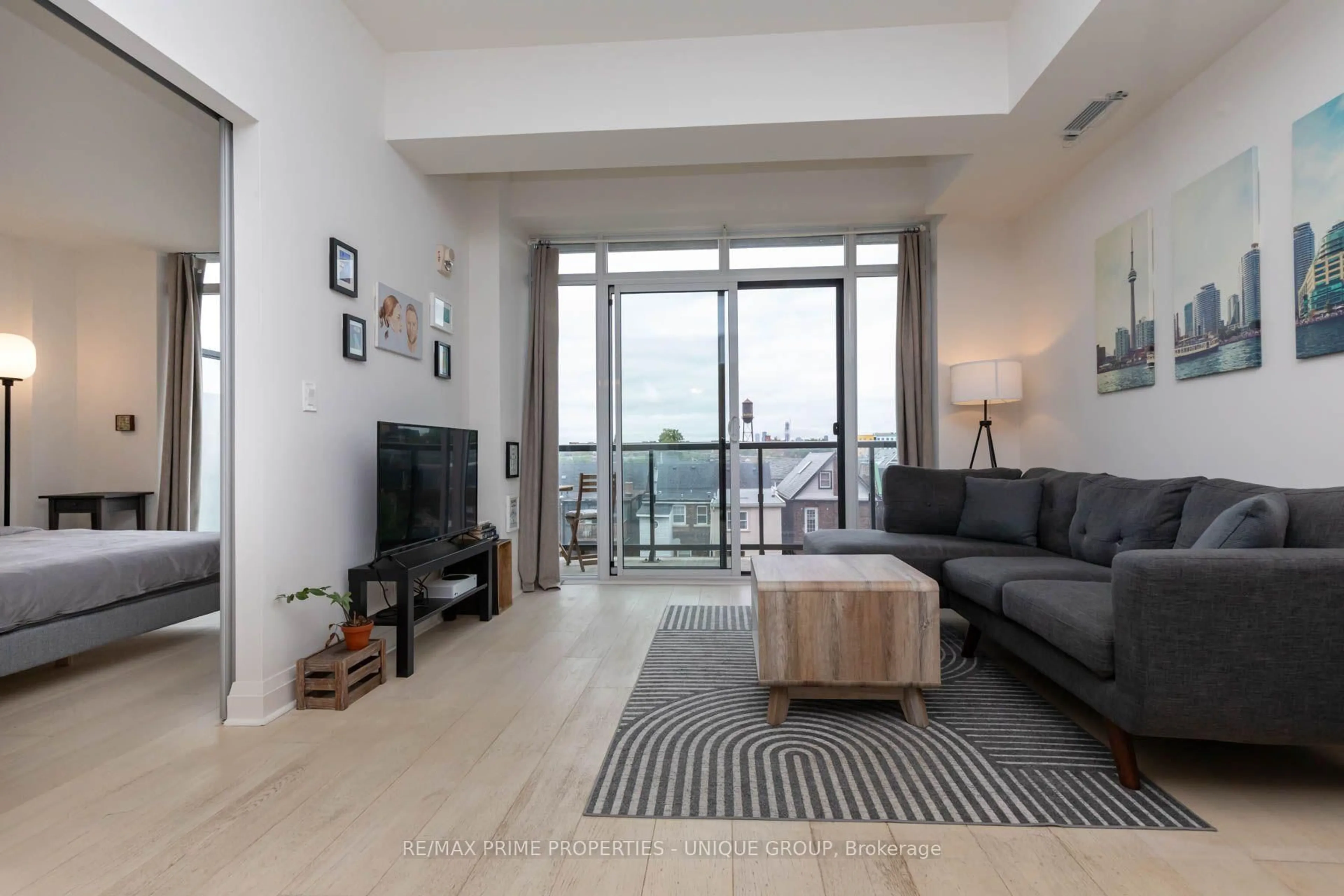 Living room with furniture, unknown for 245 Perth Ave #304, Toronto Ontario M6P 3X9