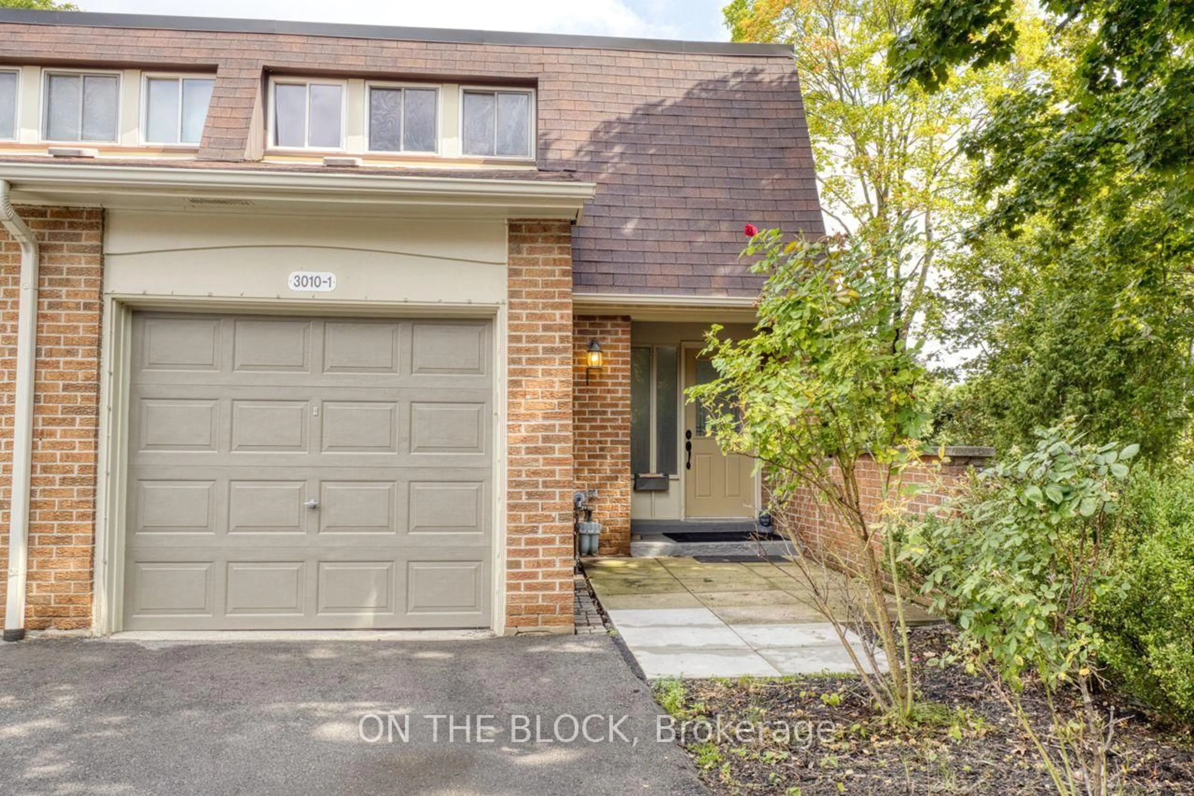 Home with brick exterior material, street for 3010 Palmer Dr #1, Burlington Ontario L7M 1L2