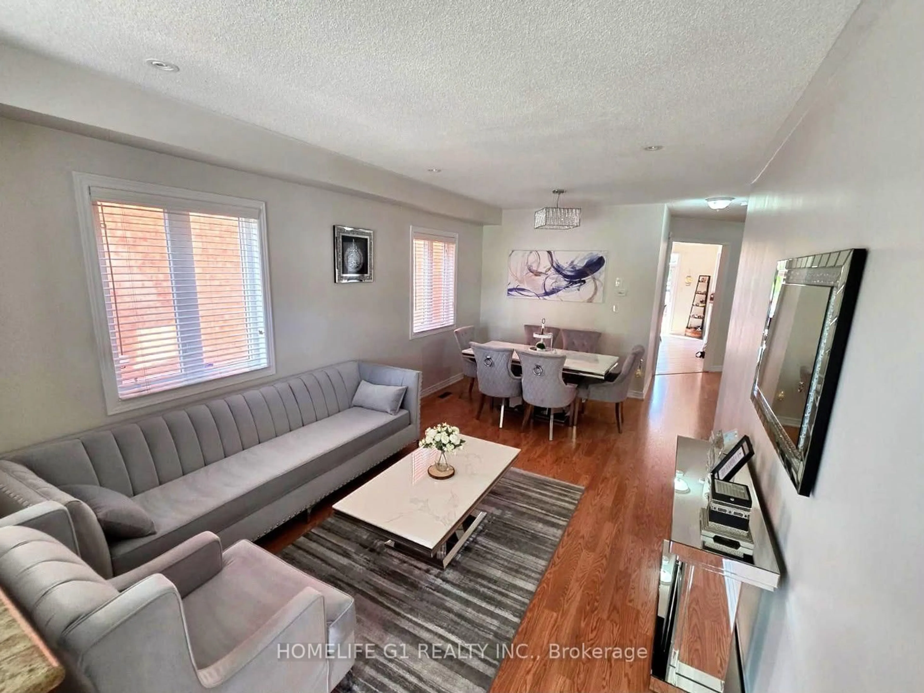 Living room with furniture, unknown for 62 Dewside Dr, Brampton Ontario L6R 0X5