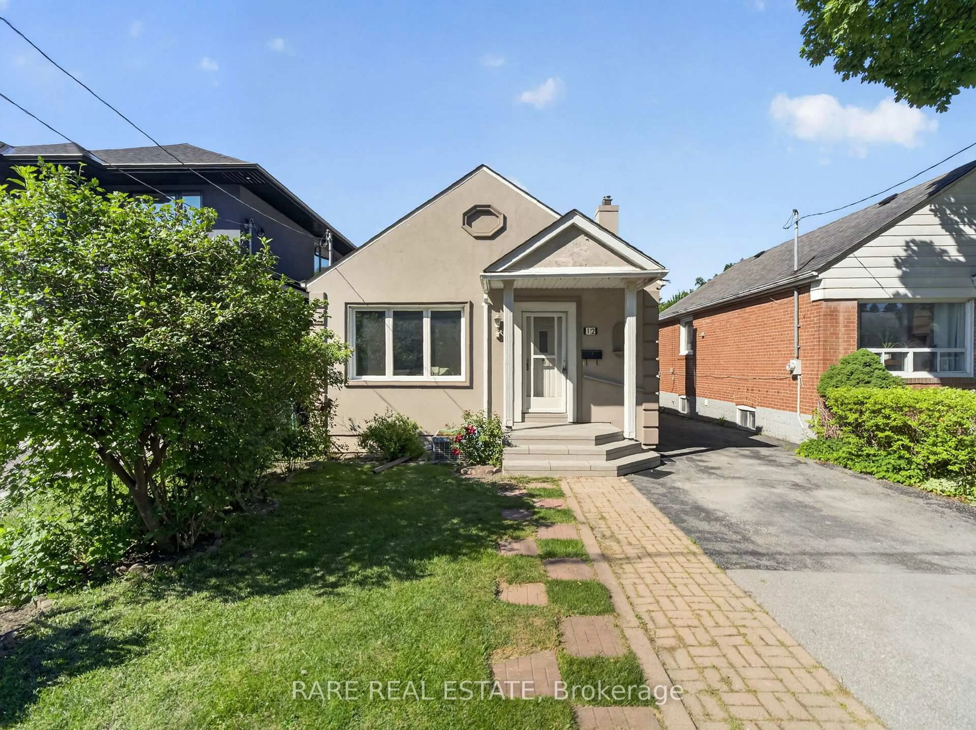 Home with brick exterior material, street for 12 Kentroyal Dr, Toronto Ontario M9P 2M8