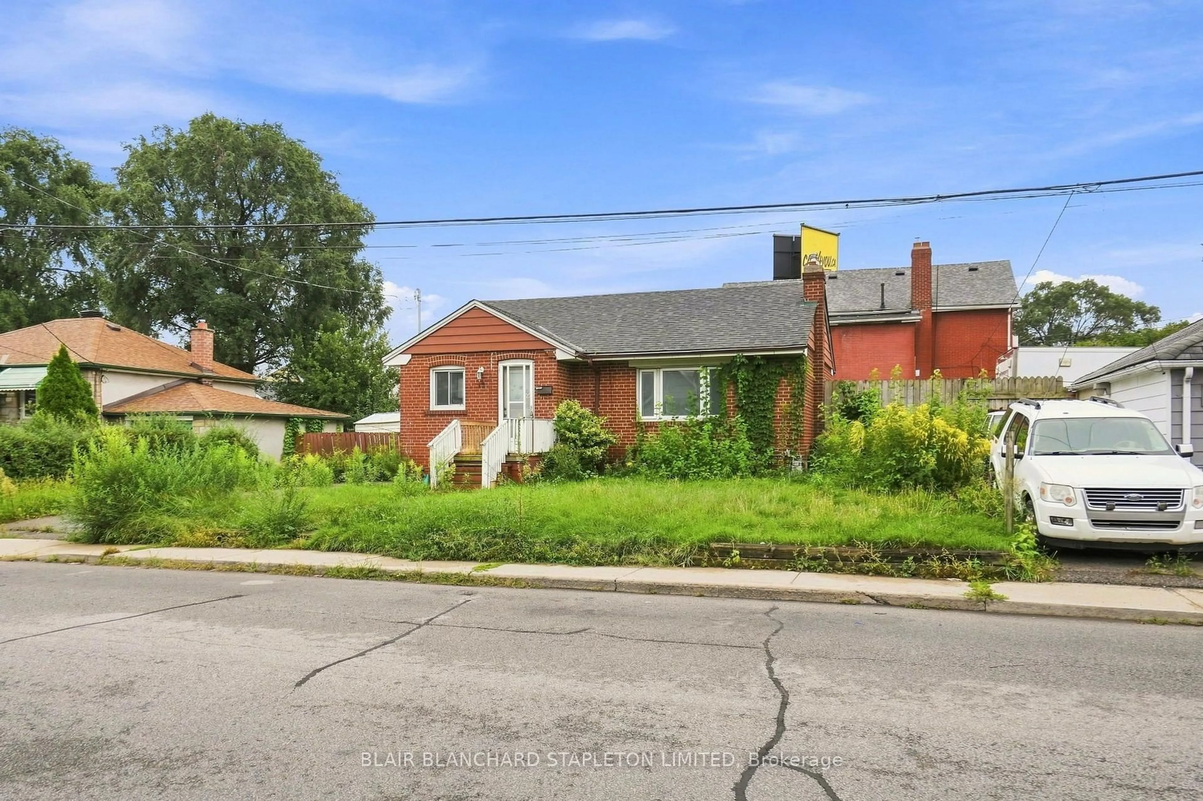 Home with brick exterior material, street for 15 Mahoney Ave, Toronto Ontario M6M 2H5