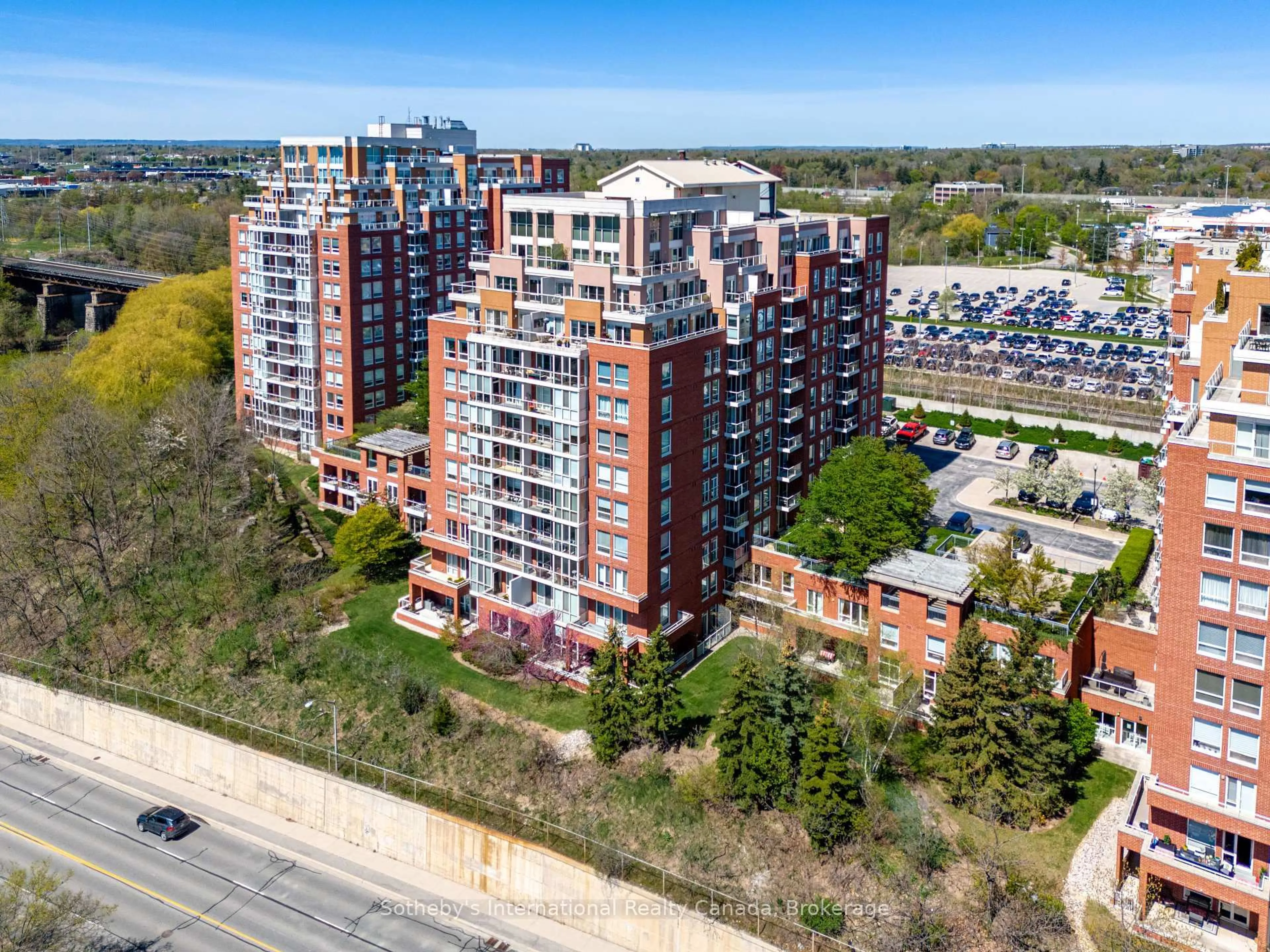 A pic from outside/outdoor area/front of a property/back of a property/a pic from drone, city buildings view from balcony for 50 Old Mill Rd #105, Oakville Ontario L6J 7W1