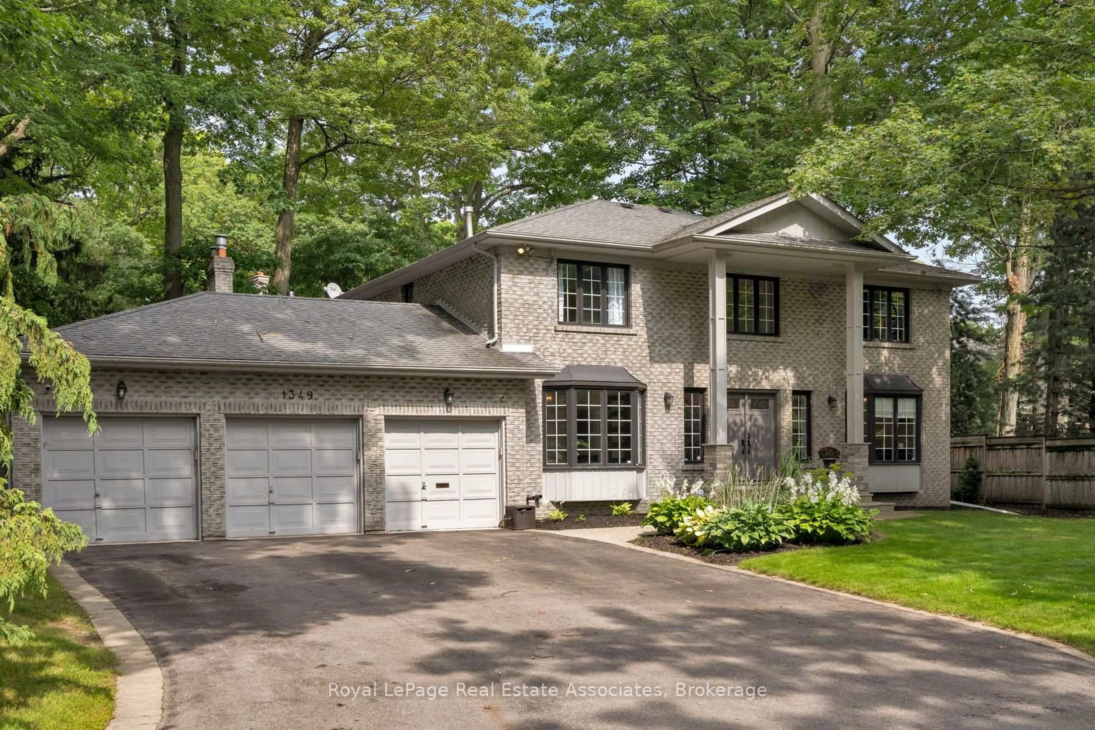 Home with brick exterior material, street for 1349 Birchwood Heights Dr, Mississauga Ontario L5G 2Y3