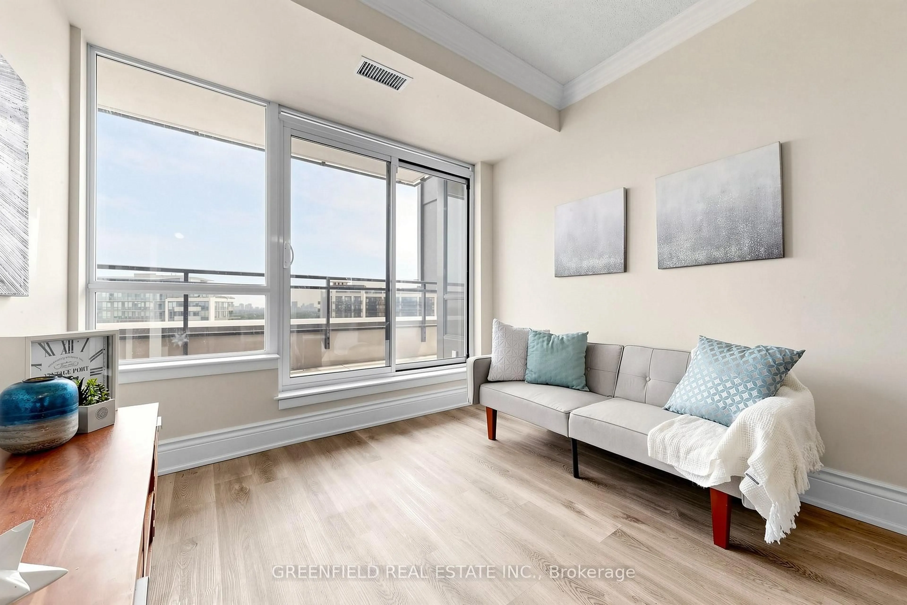 Living room with furniture, wood/laminate floor for 55 De Boers Dr #LPH2, Toronto Ontario M3J 0G5