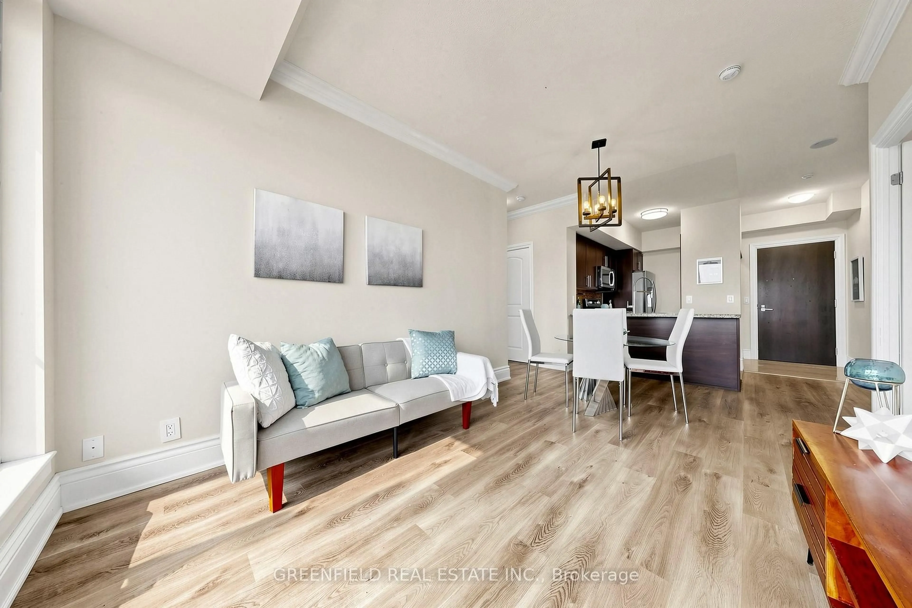 Living room with furniture, wood/laminate floor for 55 De Boers Dr #LPH2, Toronto Ontario M3J 0G5