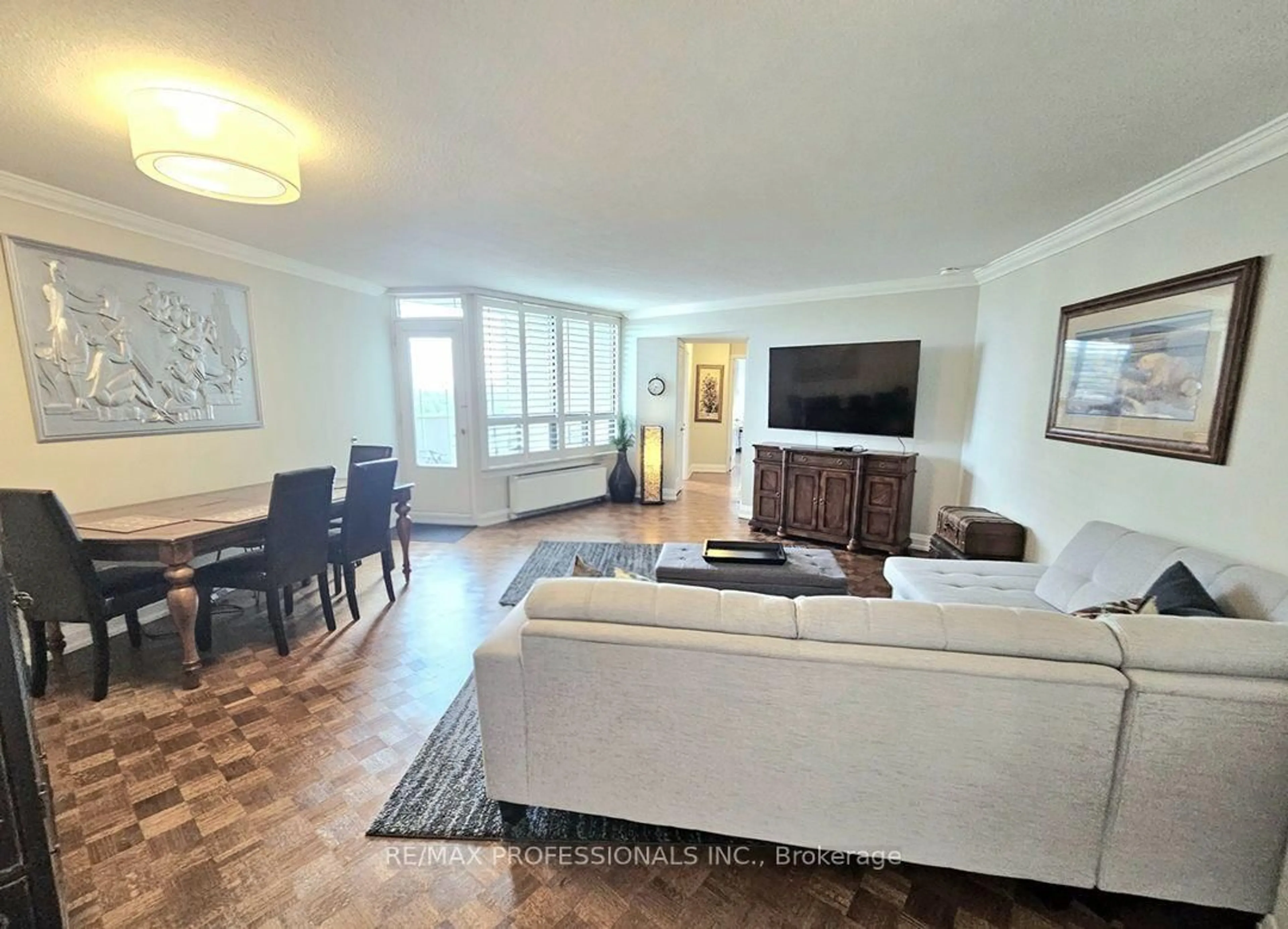Living room with furniture, unknown for 300 Mill Rd #E41, Toronto Ontario M9C 4W7