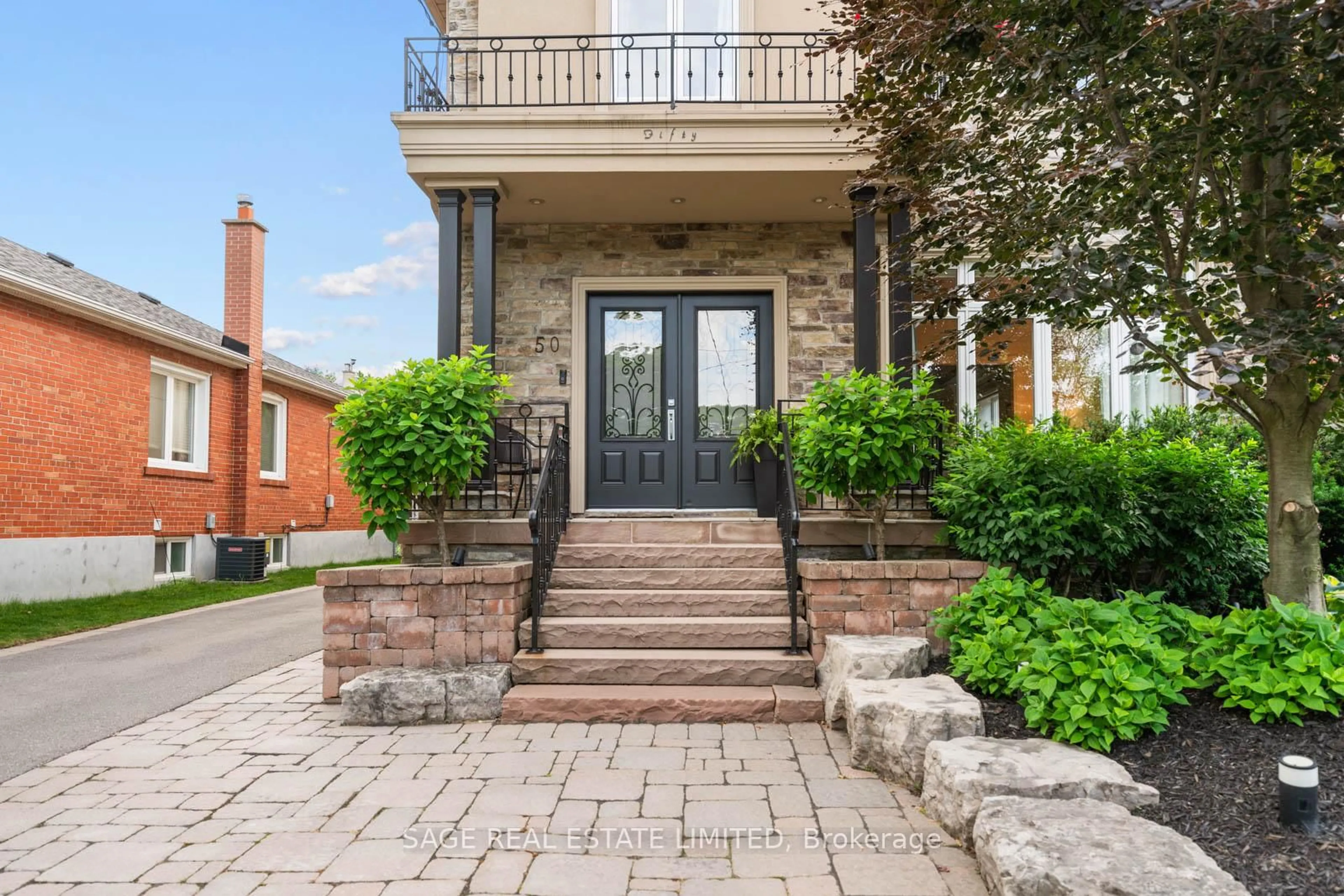 Home with brick exterior material, street for 50 Northampton Dr, Toronto Ontario M9B 4S7