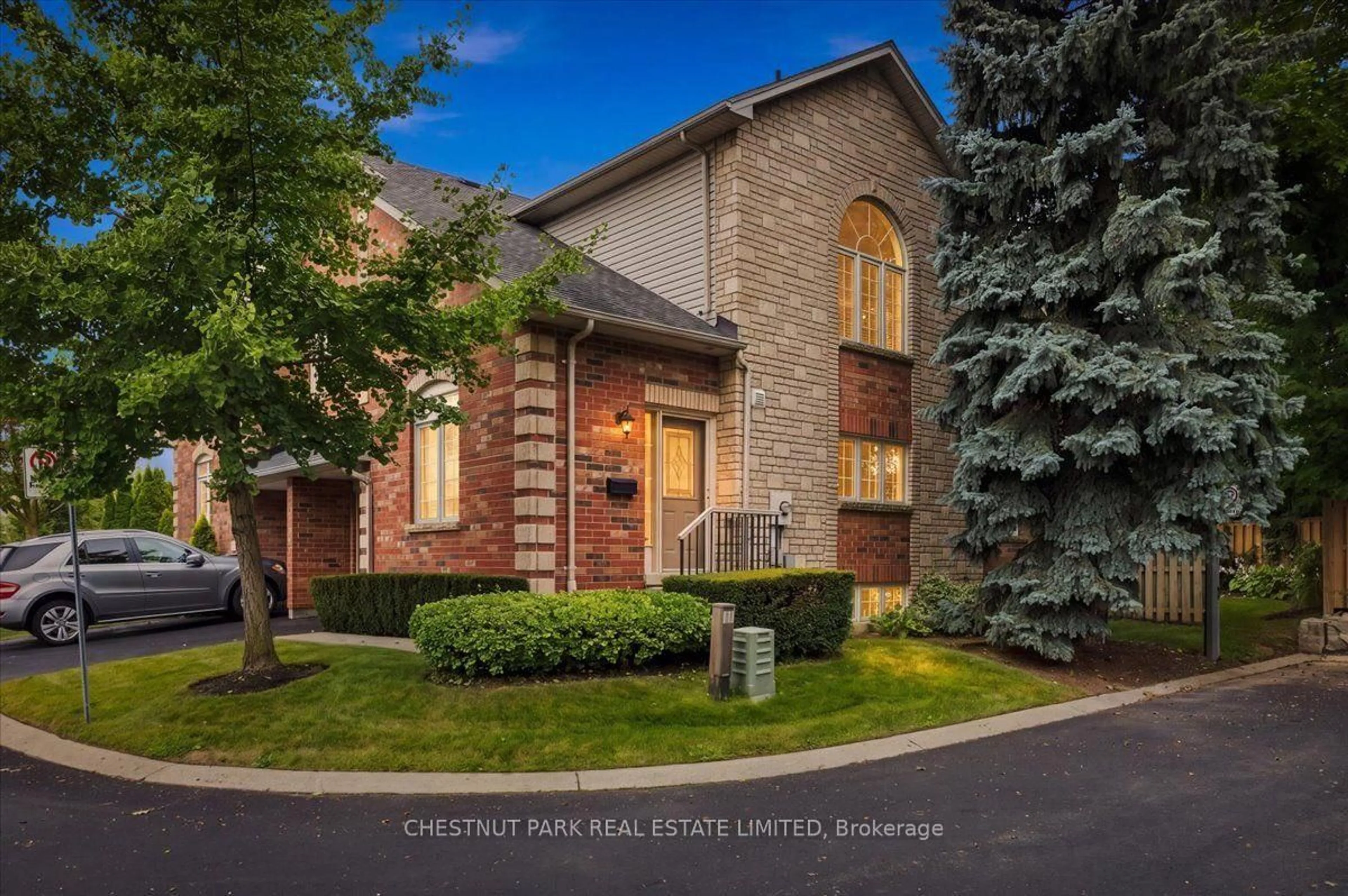 Home with brick exterior material, street for 223 Rebecca St #34, Oakville Ontario L6K 1J8