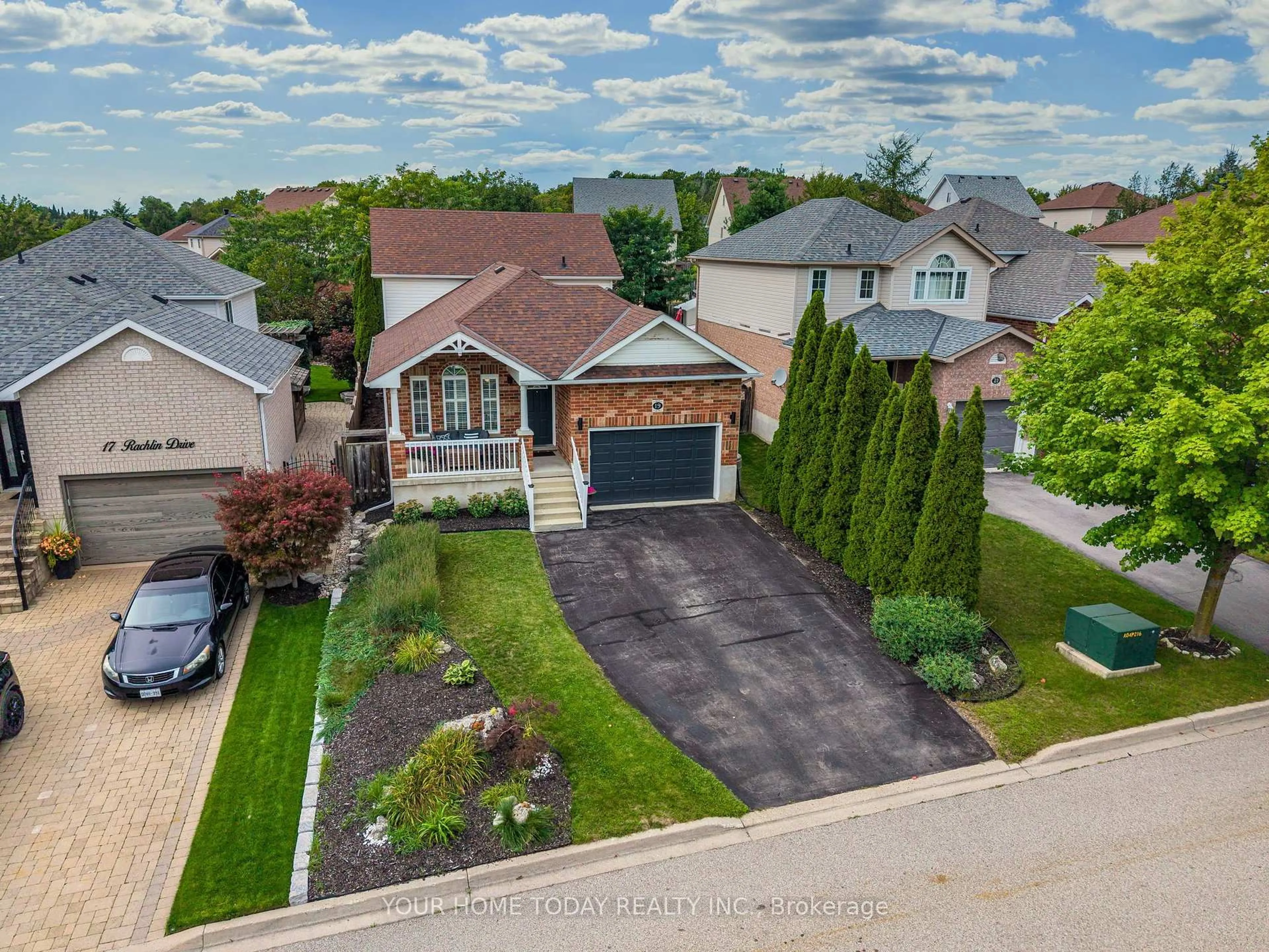 A pic from outside/outdoor area/front of a property/back of a property/a pic from drone, street for 19 Rachlin Dr, Halton Hills Ontario L7J 3A9