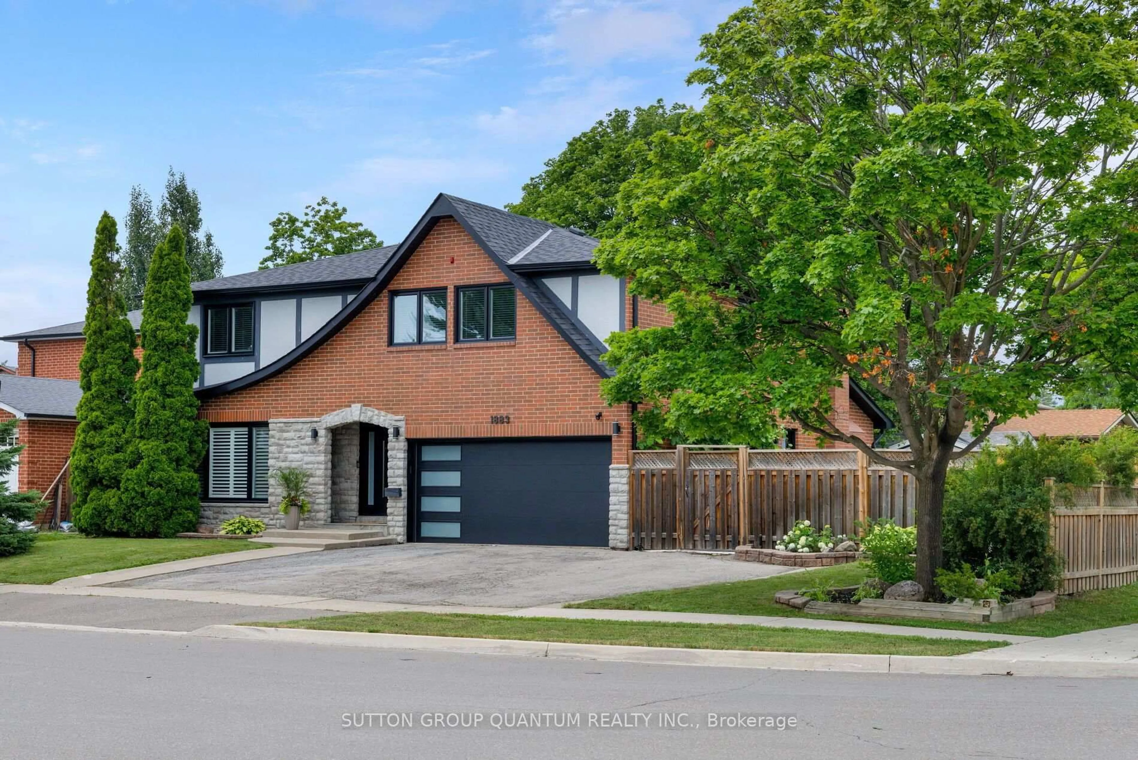 Home with brick exterior material, street for 1883 Bough Beeches Blvd, Mississauga Ontario L4W 2J8