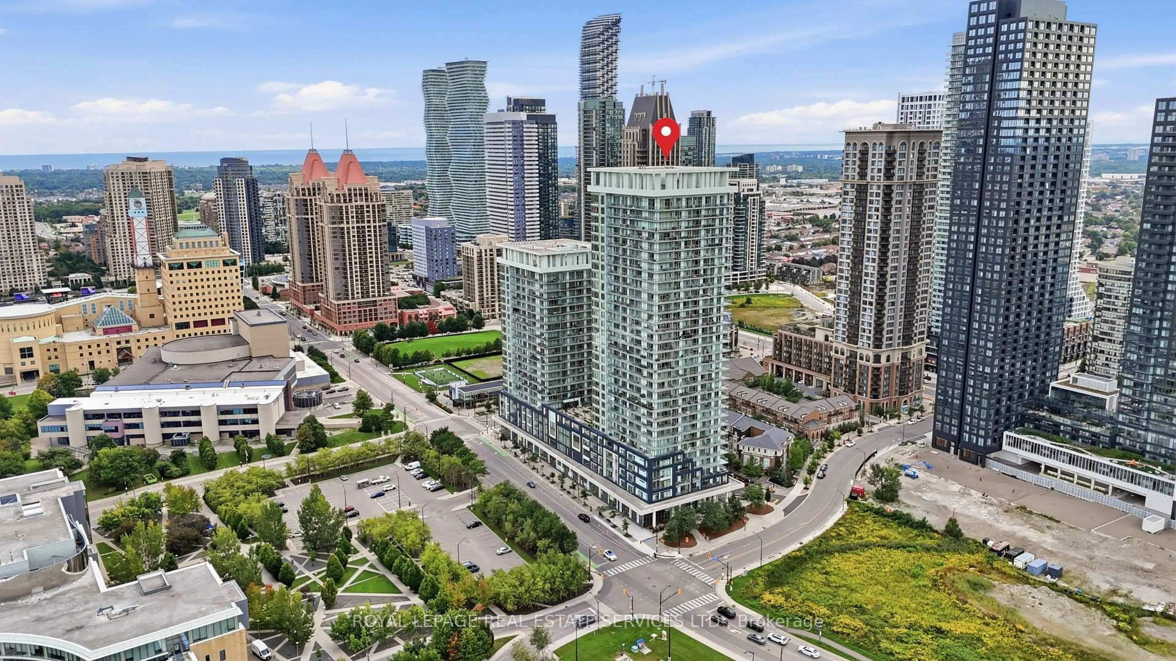 A pic from outside/outdoor area/front of a property/back of a property/a pic from drone, city buildings view from balcony for 360 Square One Dr #3002, Mississauga Ontario L5B 0E6
