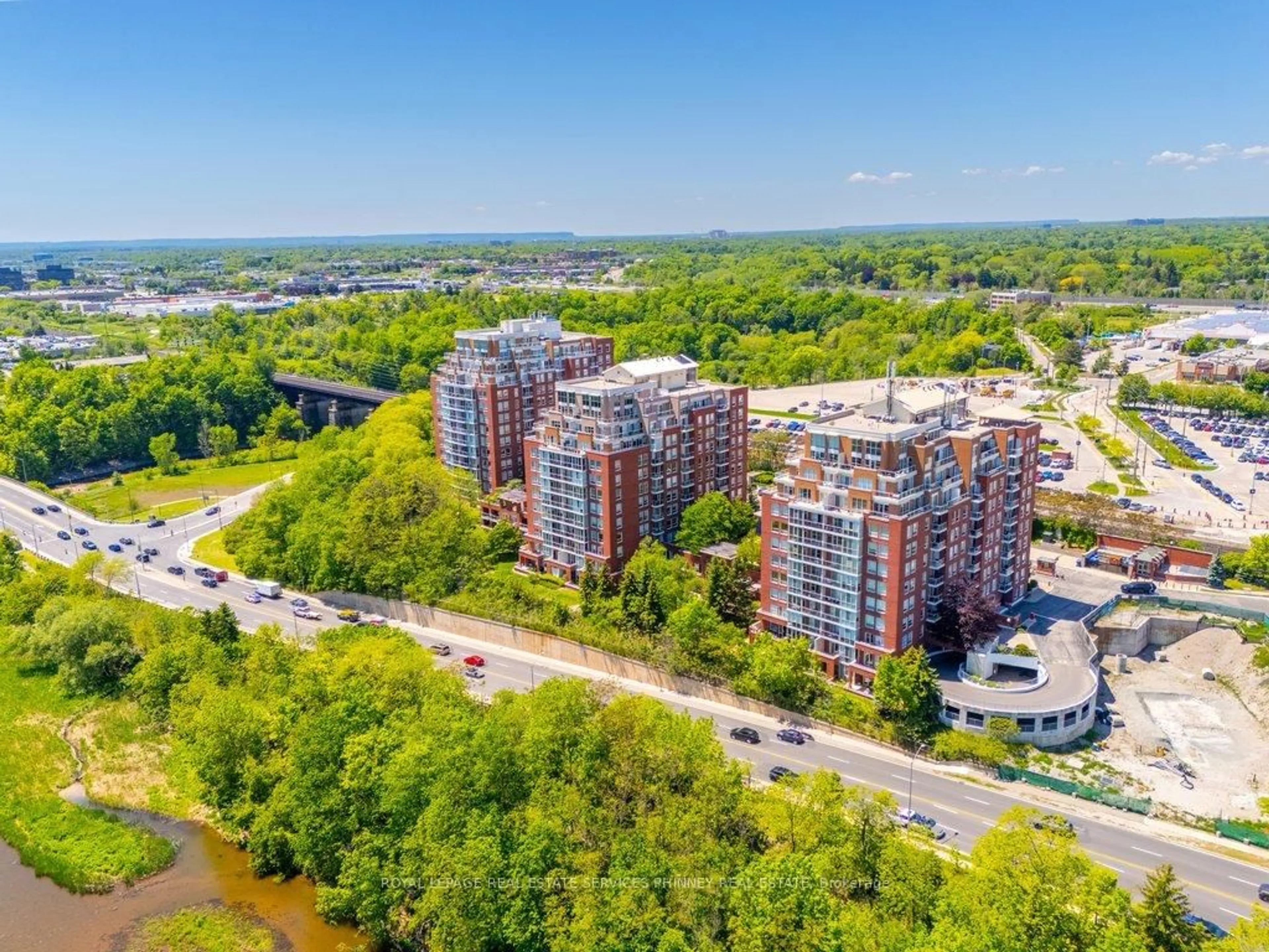 A pic from outside/outdoor area/front of a property/back of a property/a pic from drone, city buildings view from balcony for 50 Old Mill Rd #706, Oakville Ontario L6J 7W1