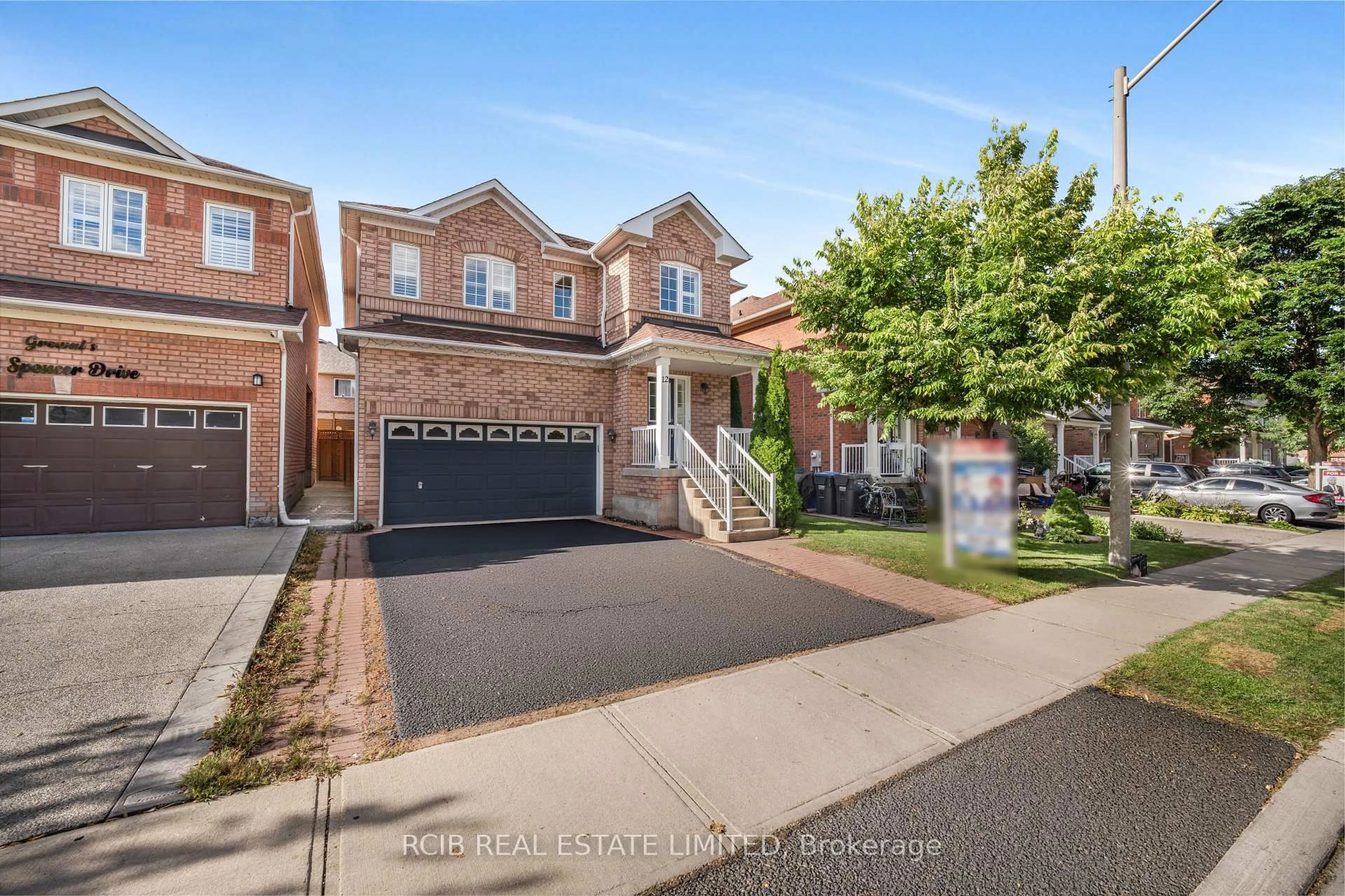 Home with brick exterior material, street for 12 Spencer Dr, Brampton Ontario L7A 2A4