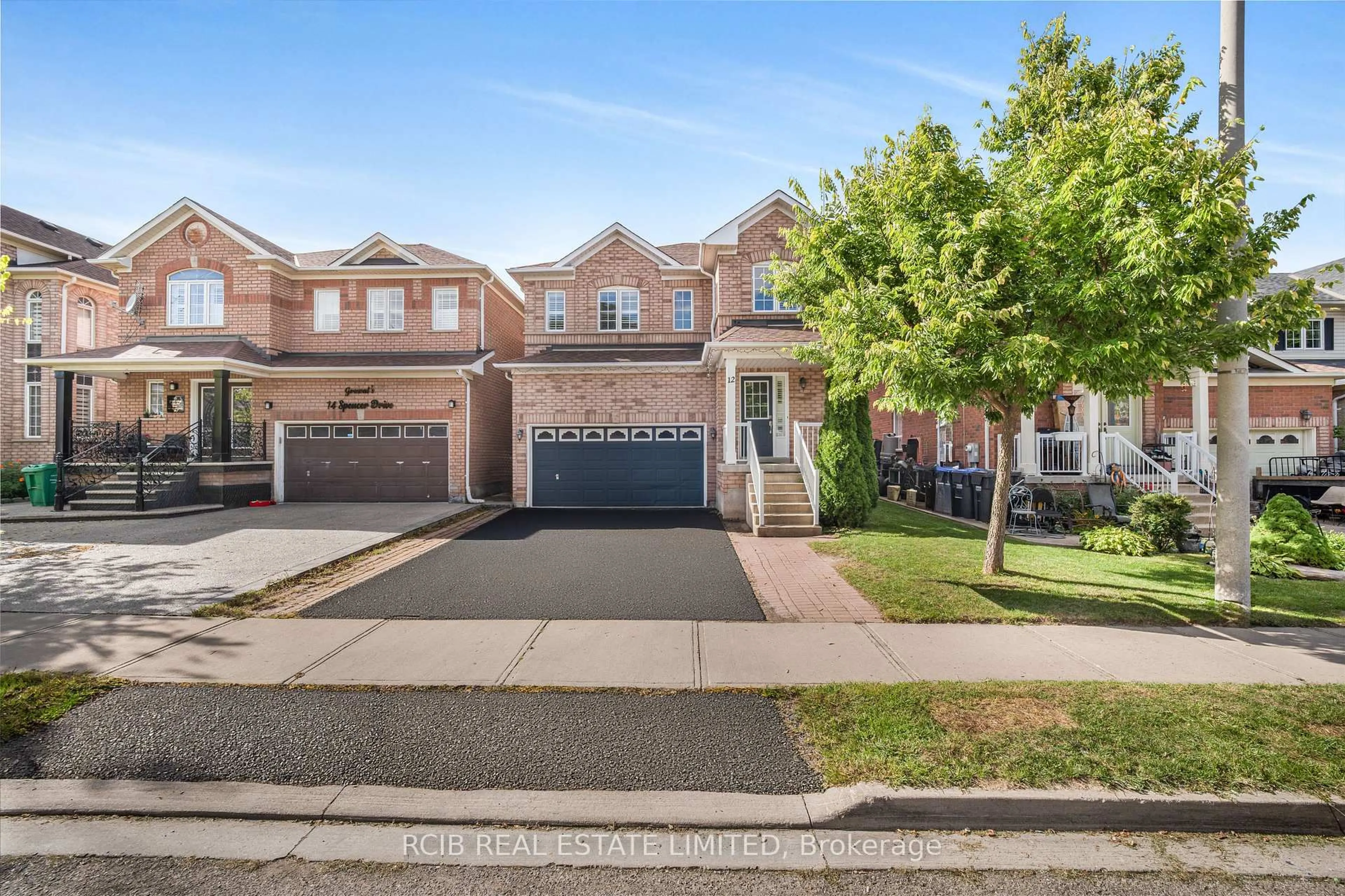 Home with brick exterior material, street for 12 Spencer Dr, Brampton Ontario L7A 2A4