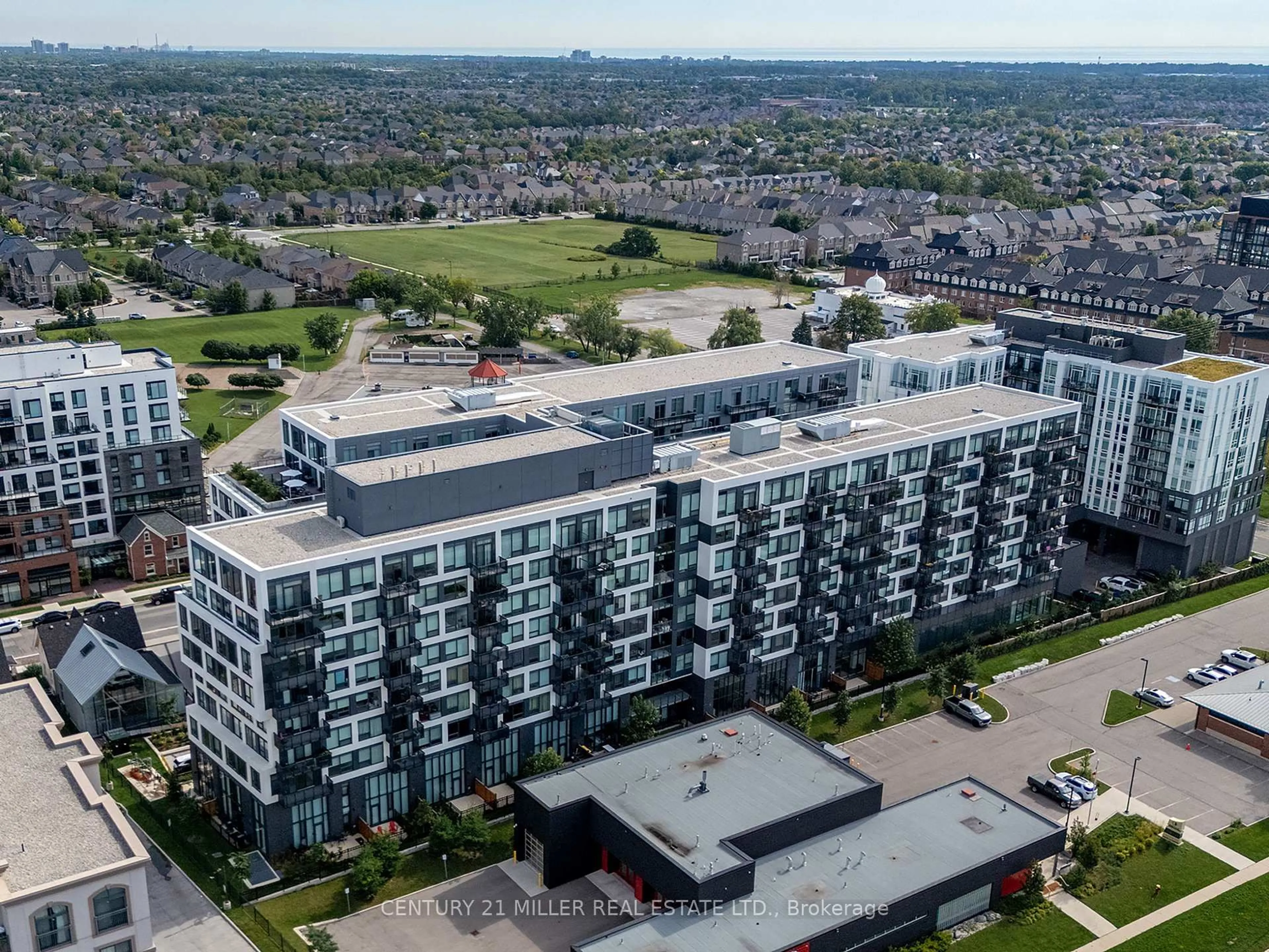 A pic from outside/outdoor area/front of a property/back of a property/a pic from drone, city buildings view from balcony for 2450 Old Bronte Rd #702, Oakville Ontario L6M 5P6