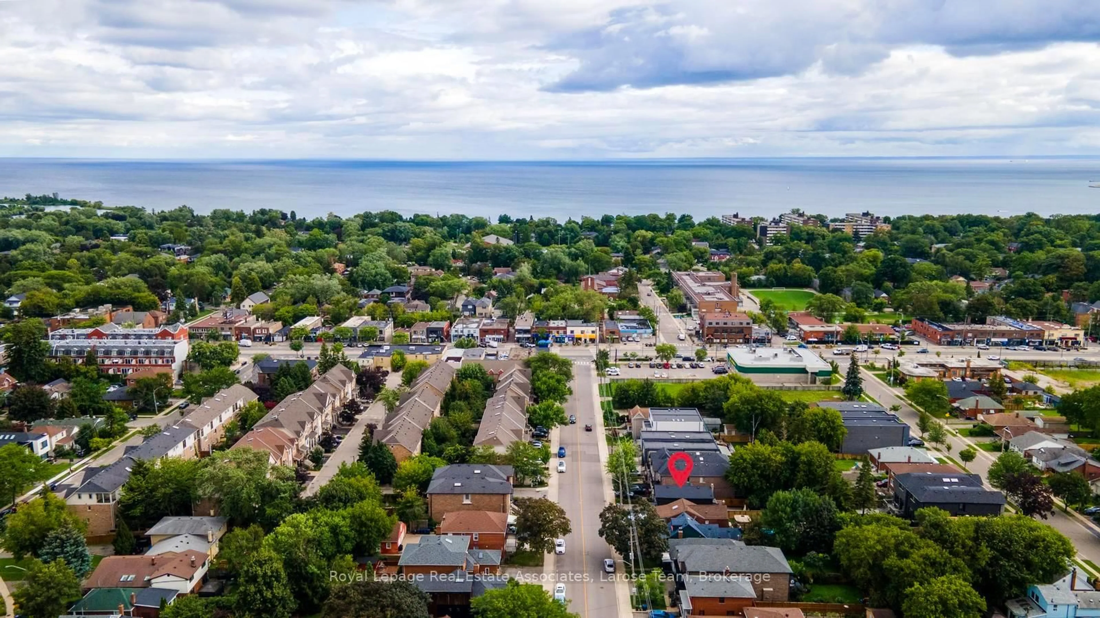 A pic from outside/outdoor area/front of a property/back of a property/a pic from drone, street for 28 Thirtieth St, Toronto Ontario M8W 3B6