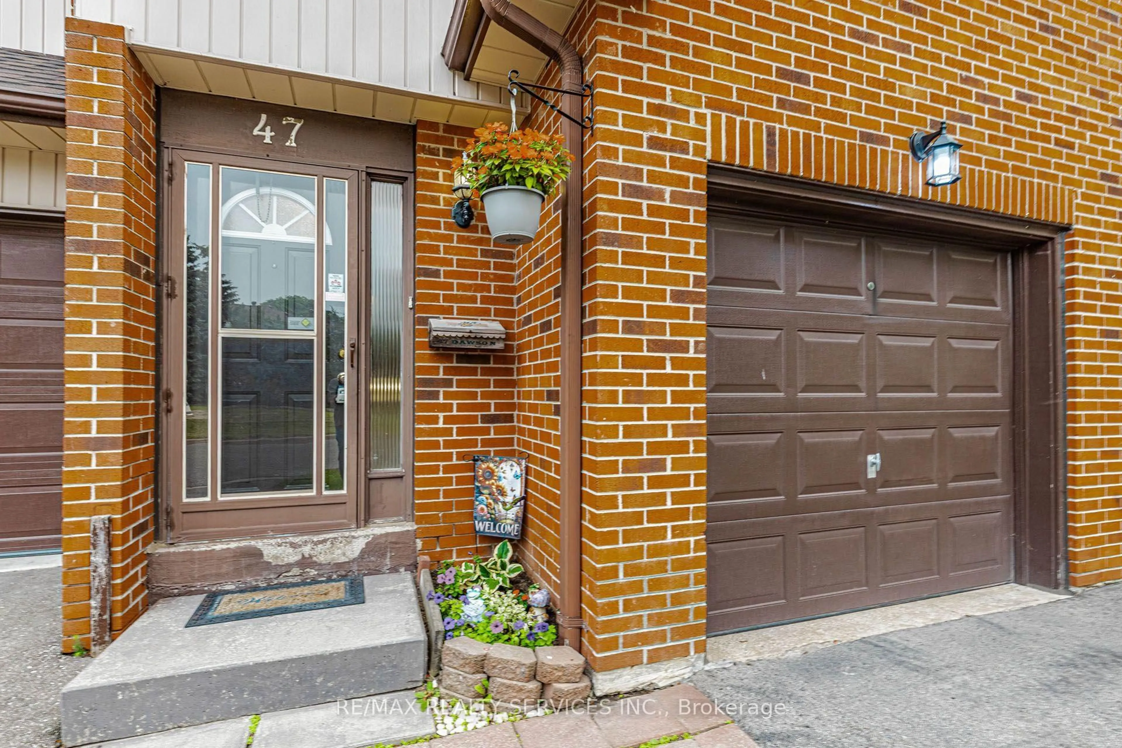 Home with brick exterior material, street for 47 Dawson Cres, Brampton Ontario L6V 3M5