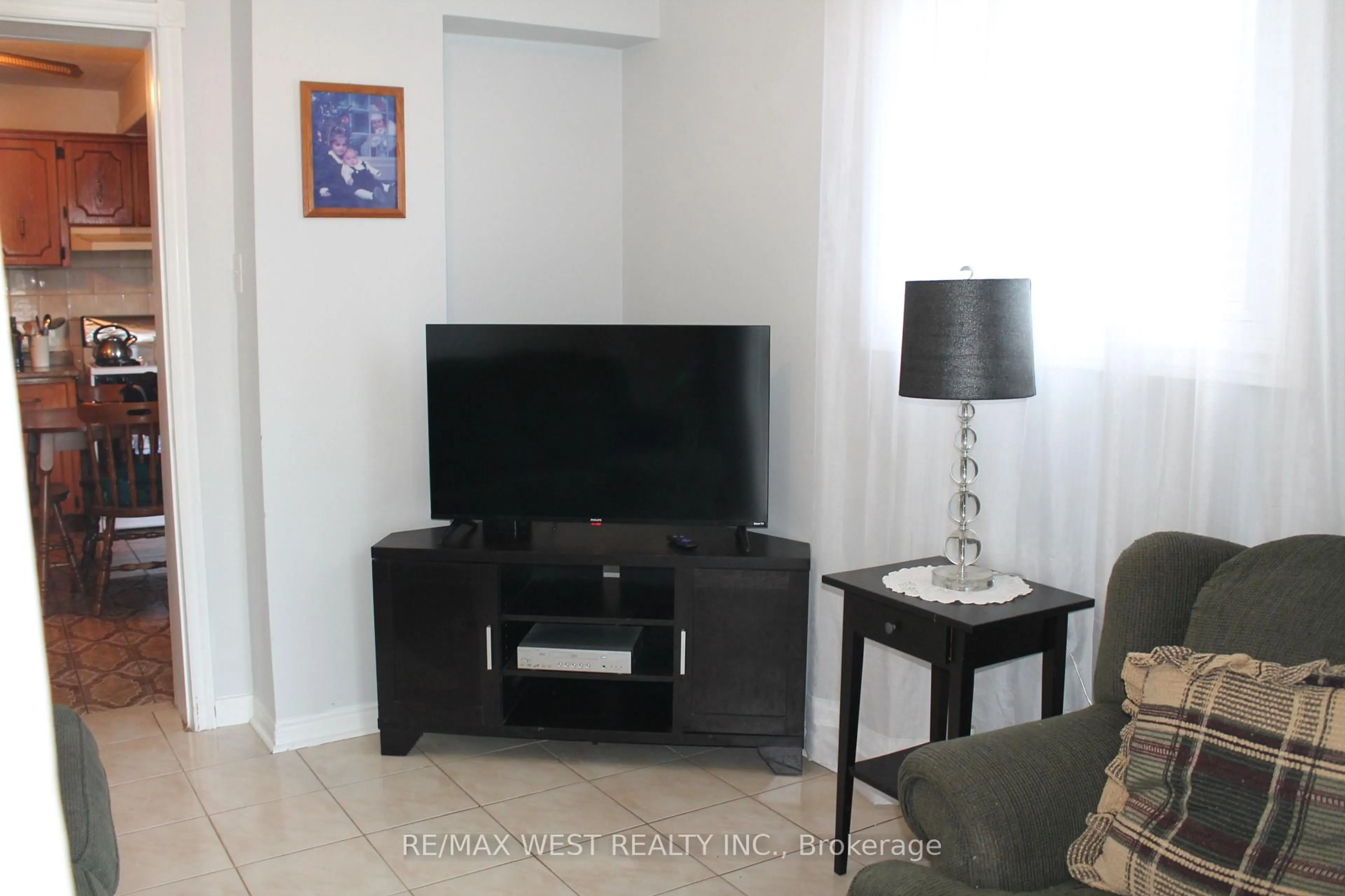 Living room with furniture, unknown for 11A Woodcroft Cres, Toronto Ontario M6E 1W7