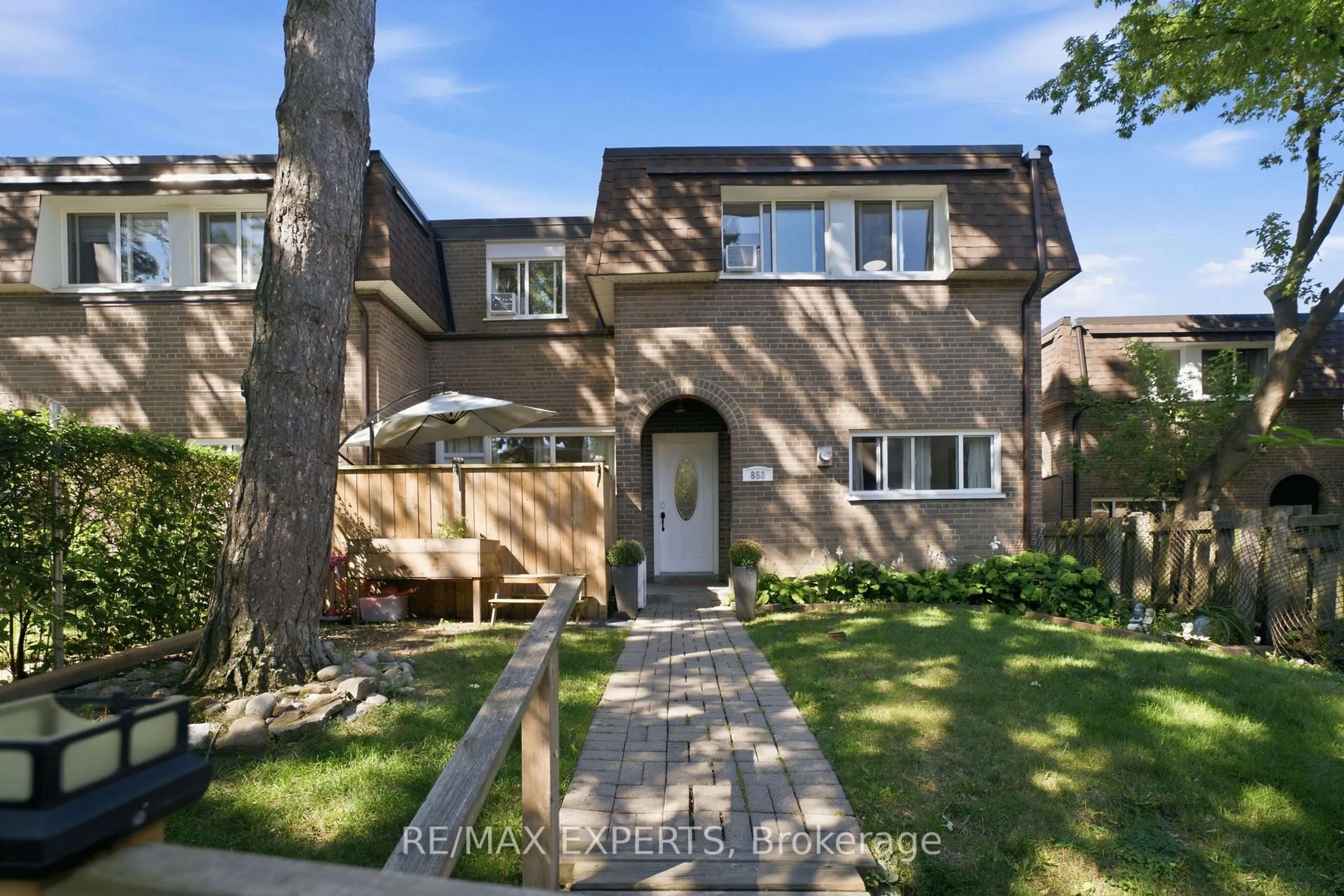 Home with brick exterior material, street for 30 Tandridge Cres #853, Toronto Ontario M9W 2P2