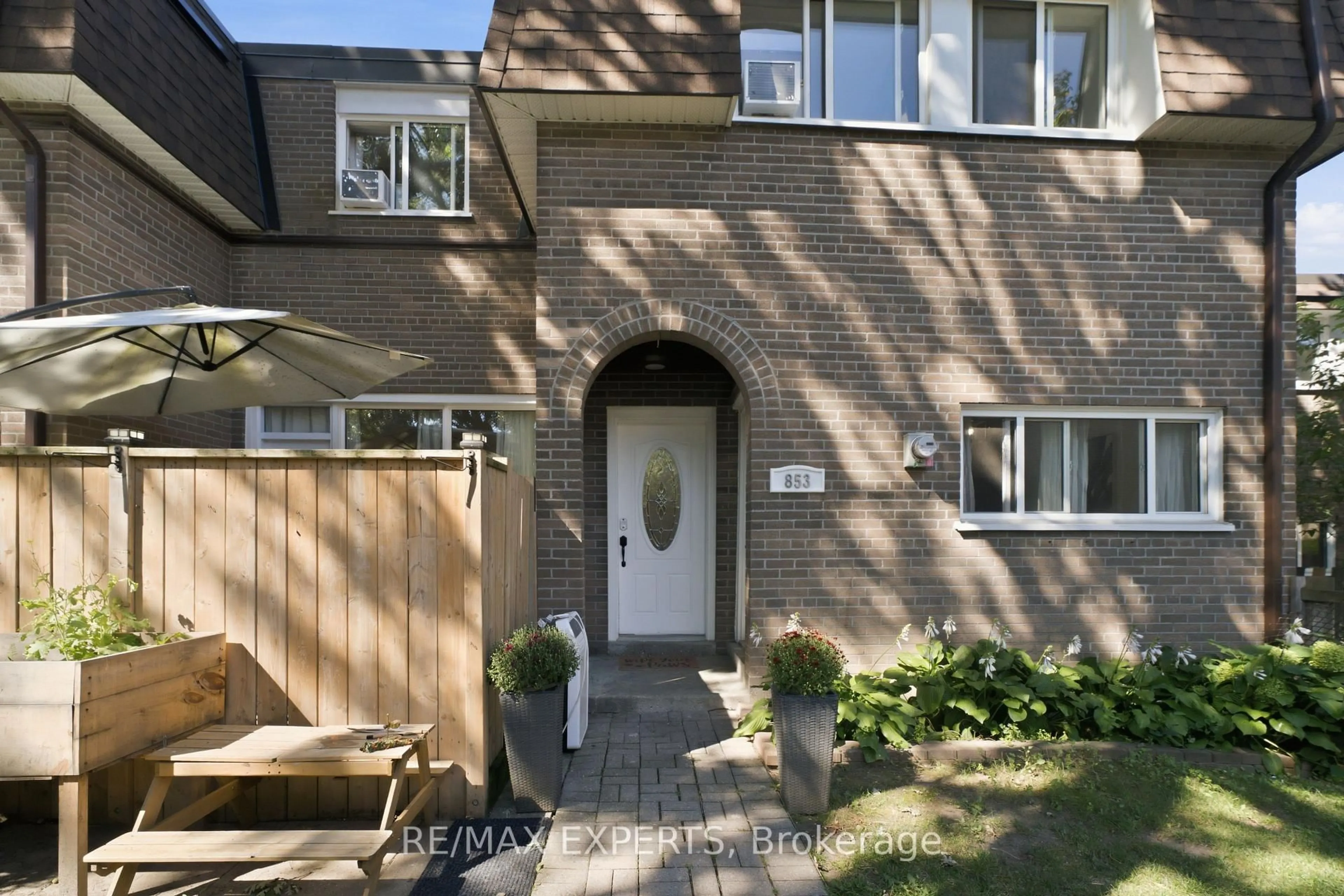 Home with brick exterior material, street for 30 Tandridge Cres #853, Toronto Ontario M9W 2P2