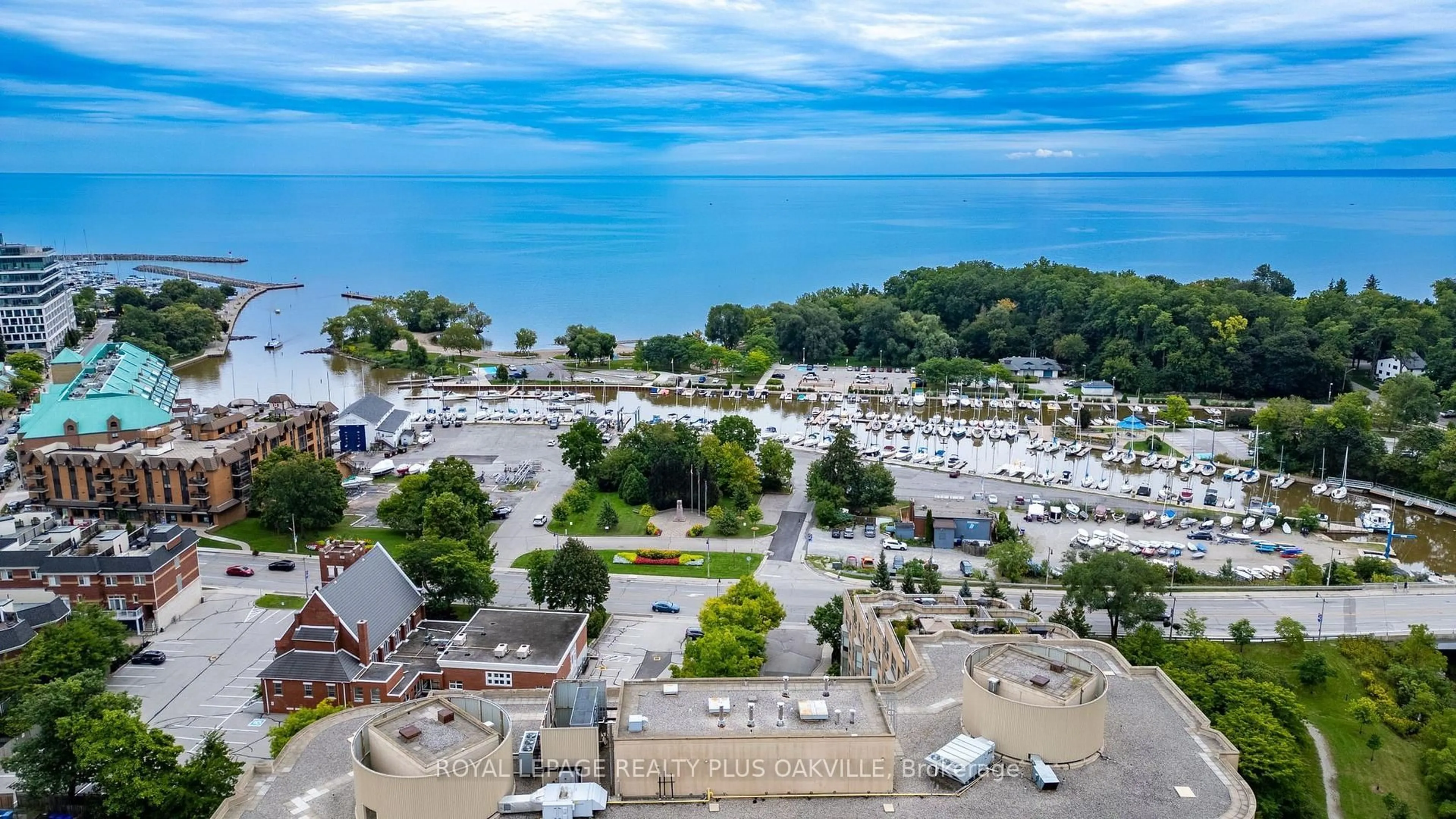 A pic from outside/outdoor area/front of a property/back of a property/a pic from drone, water/lake/river/ocean view for 2511 Lakeshore Rd #712, Oakville Ontario L6L 6L9
